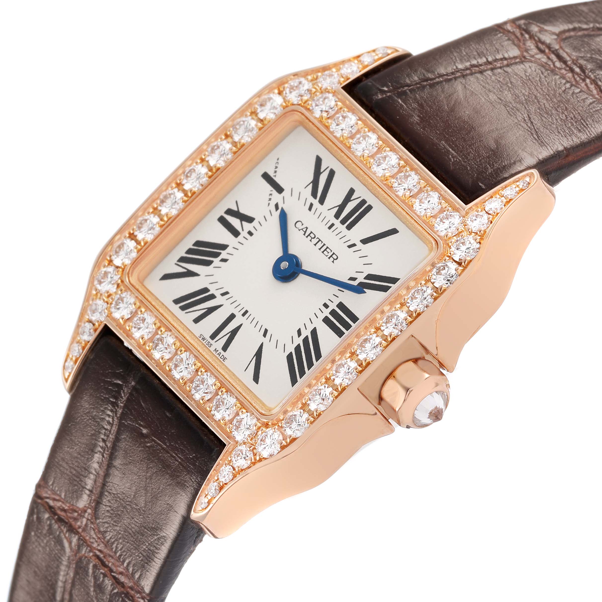 The Cartier Santos Demoiselle WF902006 Women's Rose Gold Silver Dial watch is shown at an angle highlighting the diamond-encrusted bezel, Roman numeral dial, and brown strap.