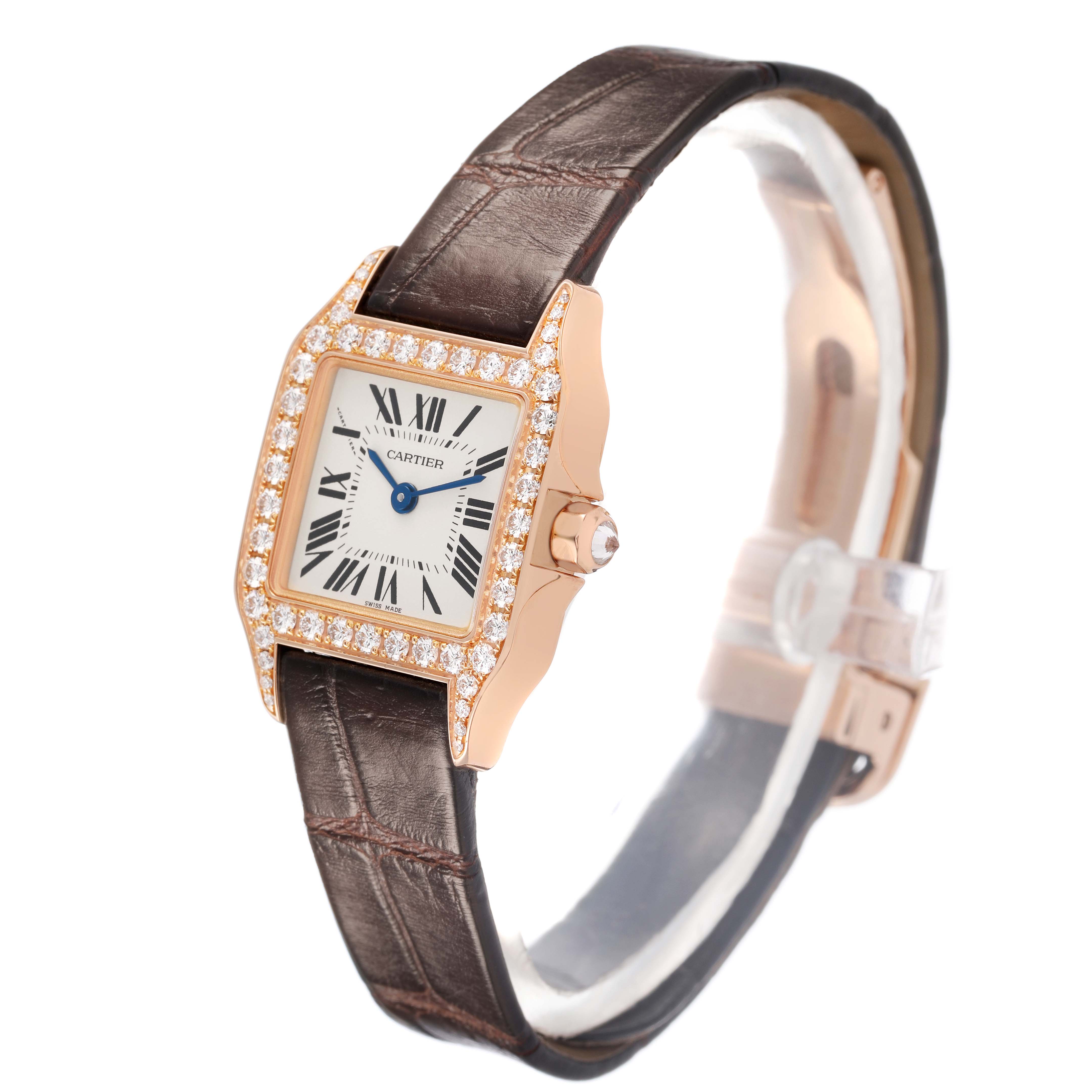 The Cartier Santos Demoiselle WF902006 Women's Rose Gold Silver Dial watch is shown at a slight angle, displaying its diamond-set bezel, dial, and leather strap.