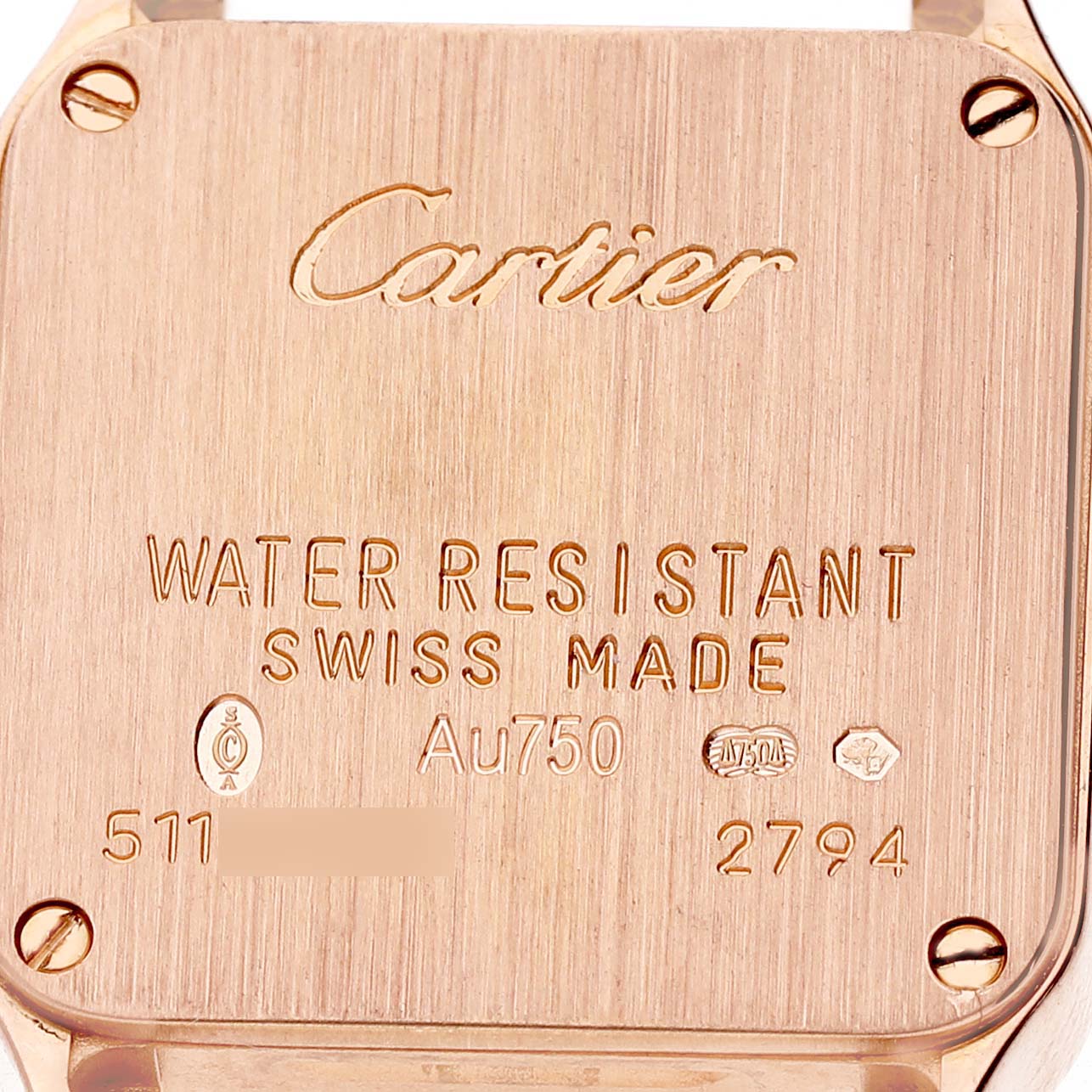 The image shows the back case of a Cartier Santos Demoiselle WF902006 Women's Rose Gold Silver Dial watch, highlighting its water resistance and Swiss Made inscription.