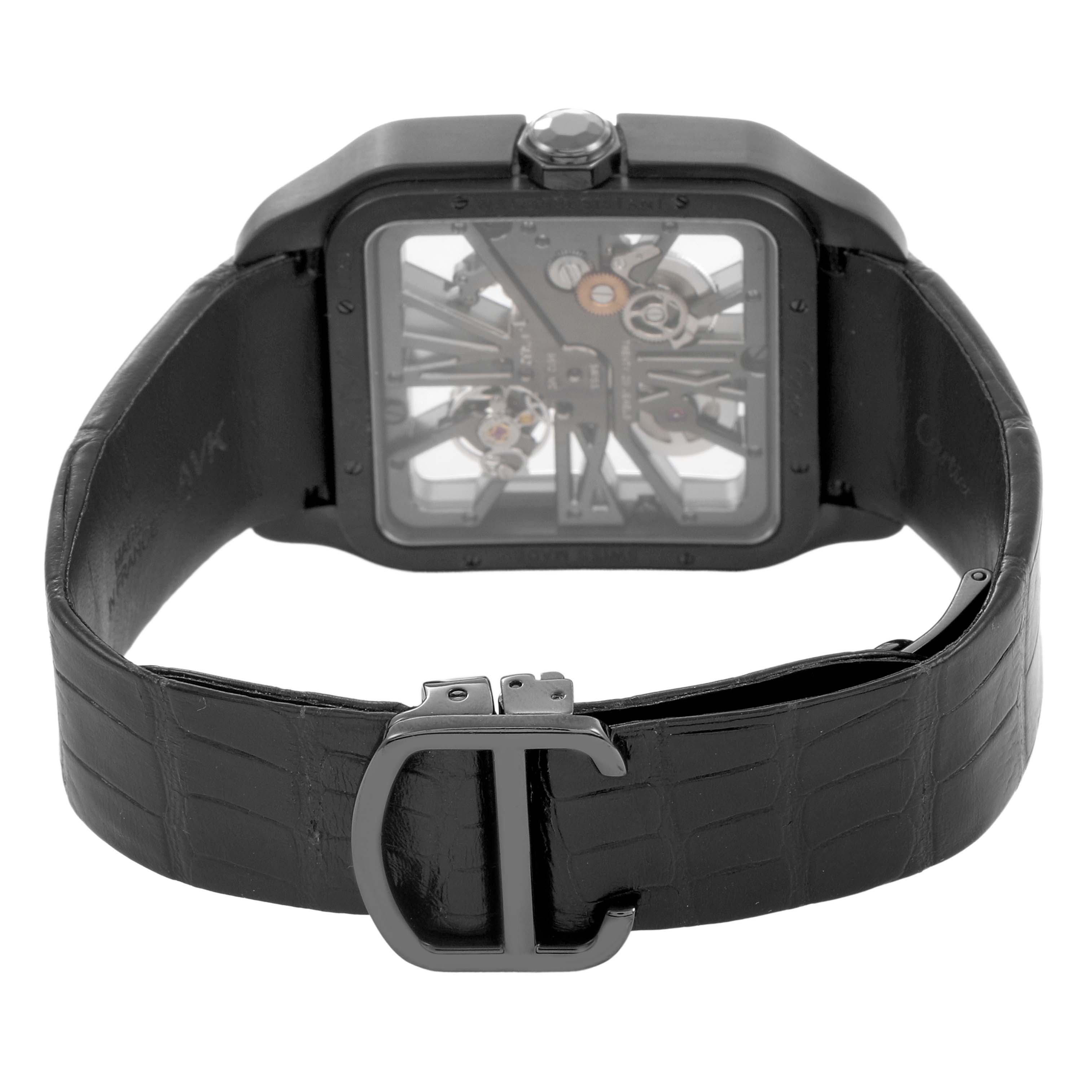 The image shows a Cartier Santos Dumont W2020052 Men's Titanium Transparent Dial watch from the rear, highlighting the clasp and skeletonized back.