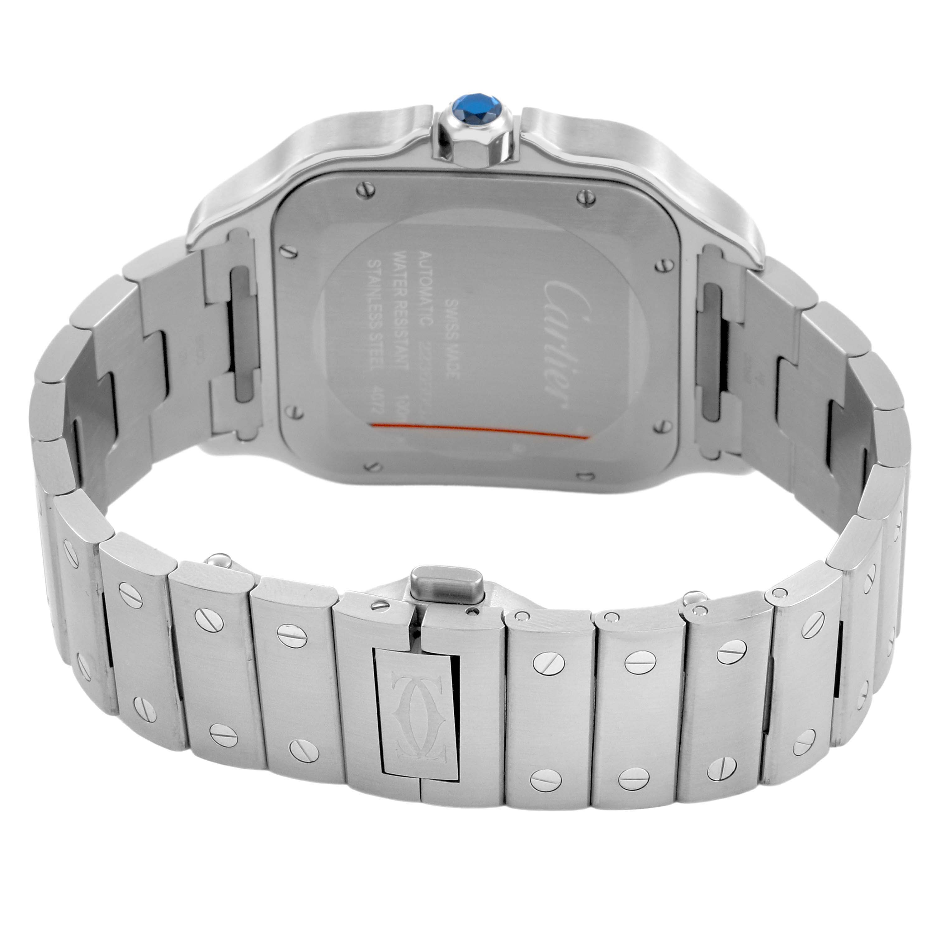 The image shows the back view of a Cartier Santos WSSA0048 Men's Stainless Steel Blue Dial watch, highlighting the bracelet and clasp.