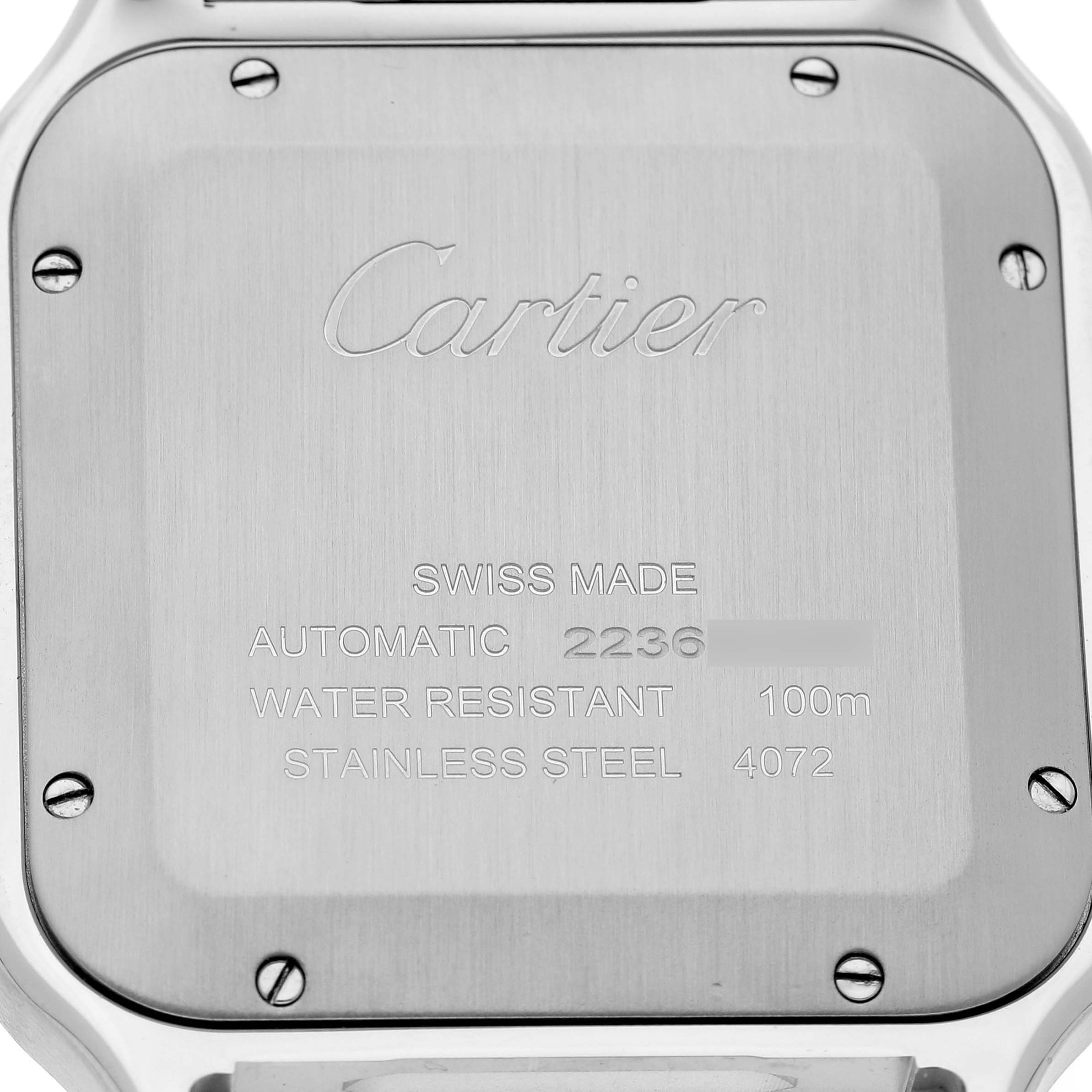 The image shows the case back of the Cartier Santos WSSA0048 Men's Stainless Steel Blue Dial watch, displaying branding and specifications.