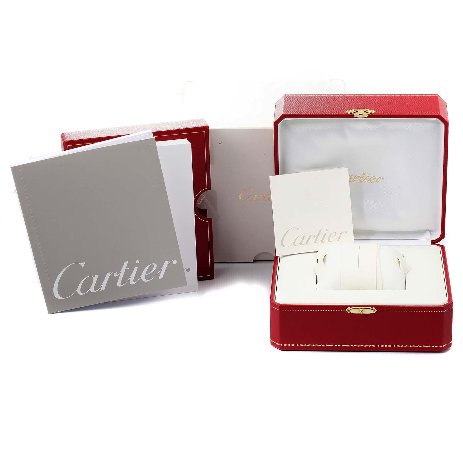 The image shows the packaging, box, and booklet for the Cartier Tank Americaine W2603256 Men
s Stainless Steel Silver Dial W2603256 Men
s Stainless Steel Silver Dial watch.