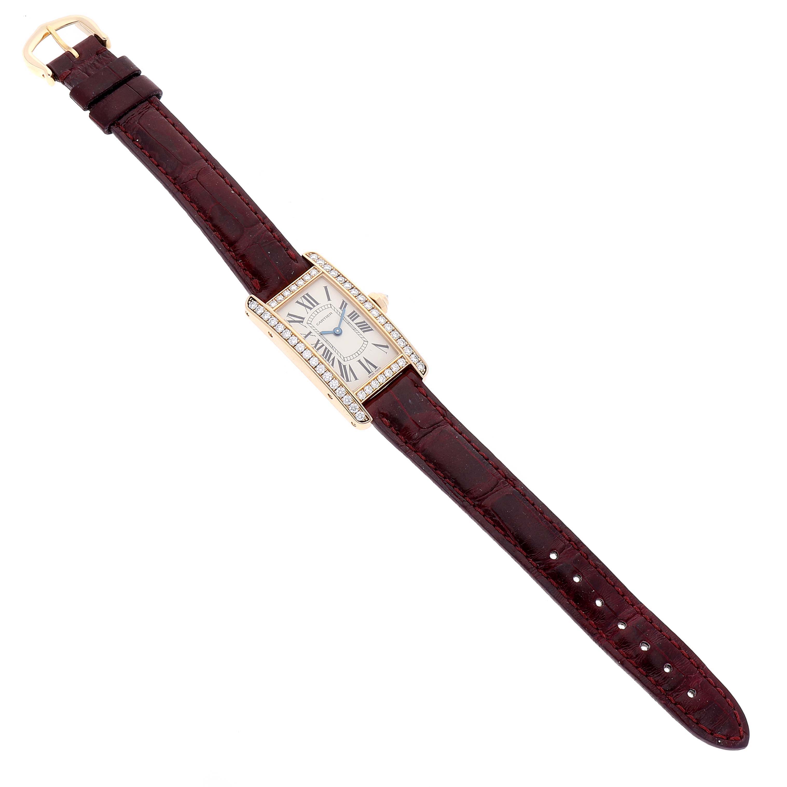 The image shows a Cartier Tank Américaine watch, viewed from above, displaying the face, brown leather strap, and gold buckle.