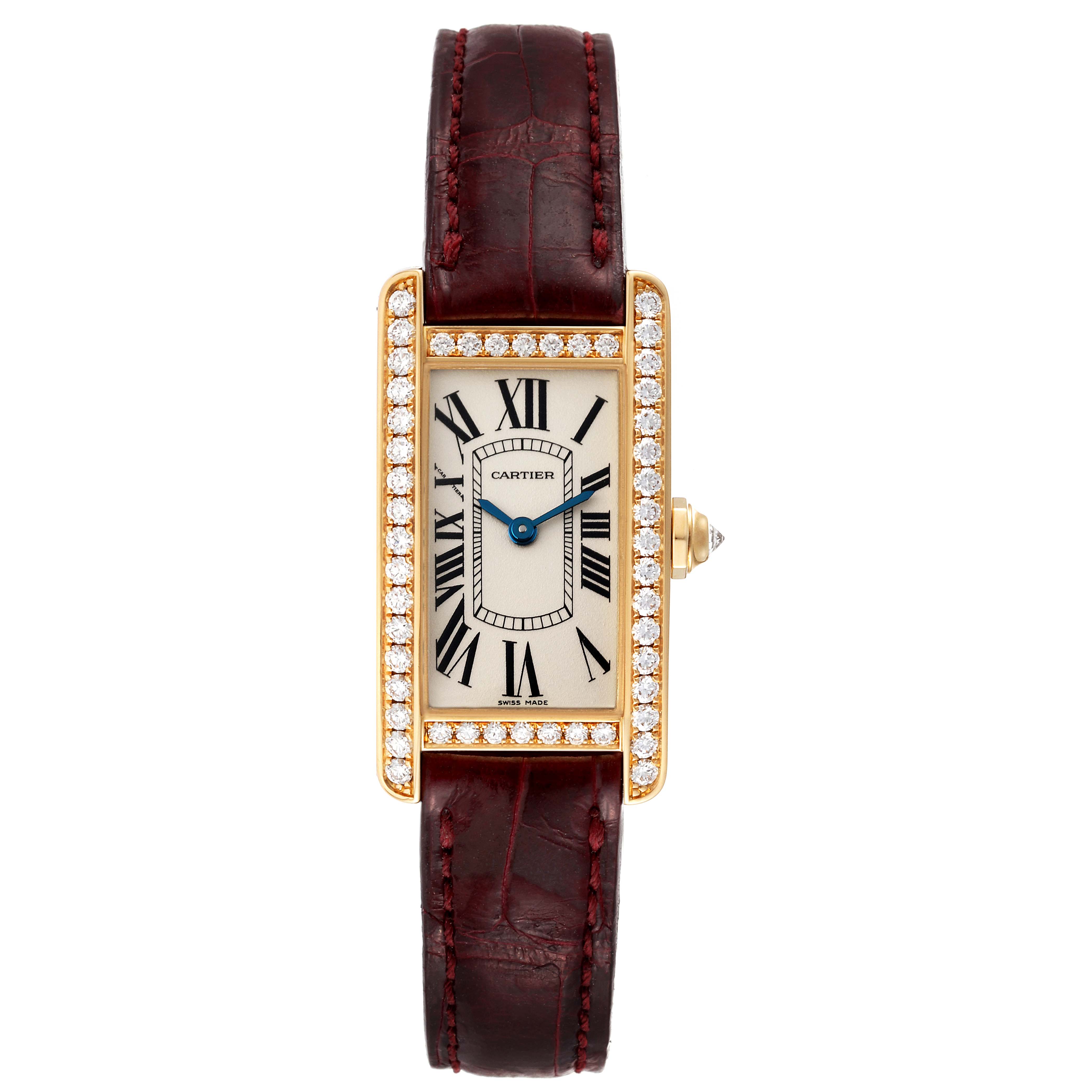 This Cartier Tank Americaine WB707231 Women's Yellow Gold Silver Dial WB707231 Women's Yellow Gold Silver Dial watch is shown from a top-down angle, displaying its rectangular face and brown leather strap.