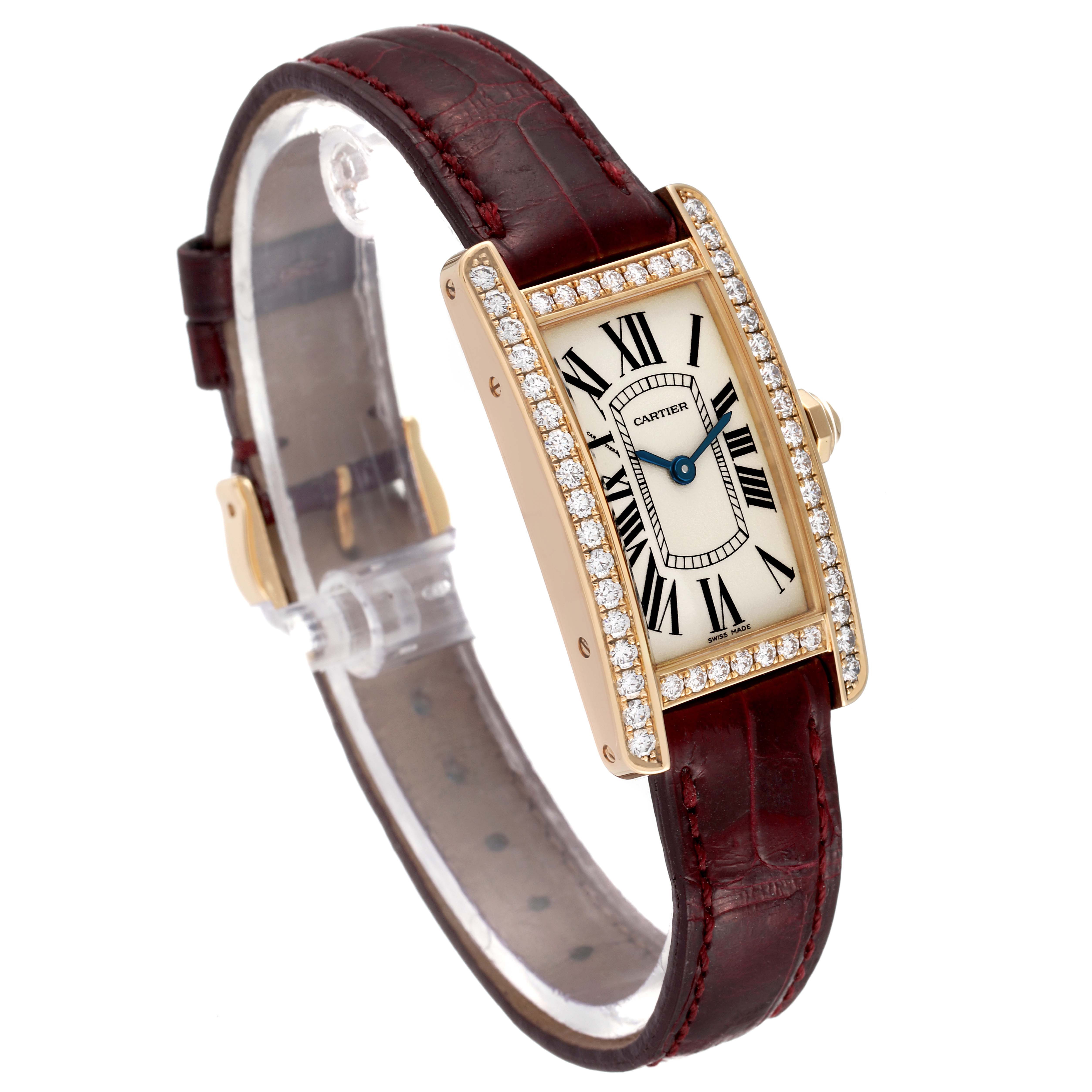 The image shows a Cartier Tank Américaine watch at an angled view, highlighting its face, diamond bezel, strap, and side crown.