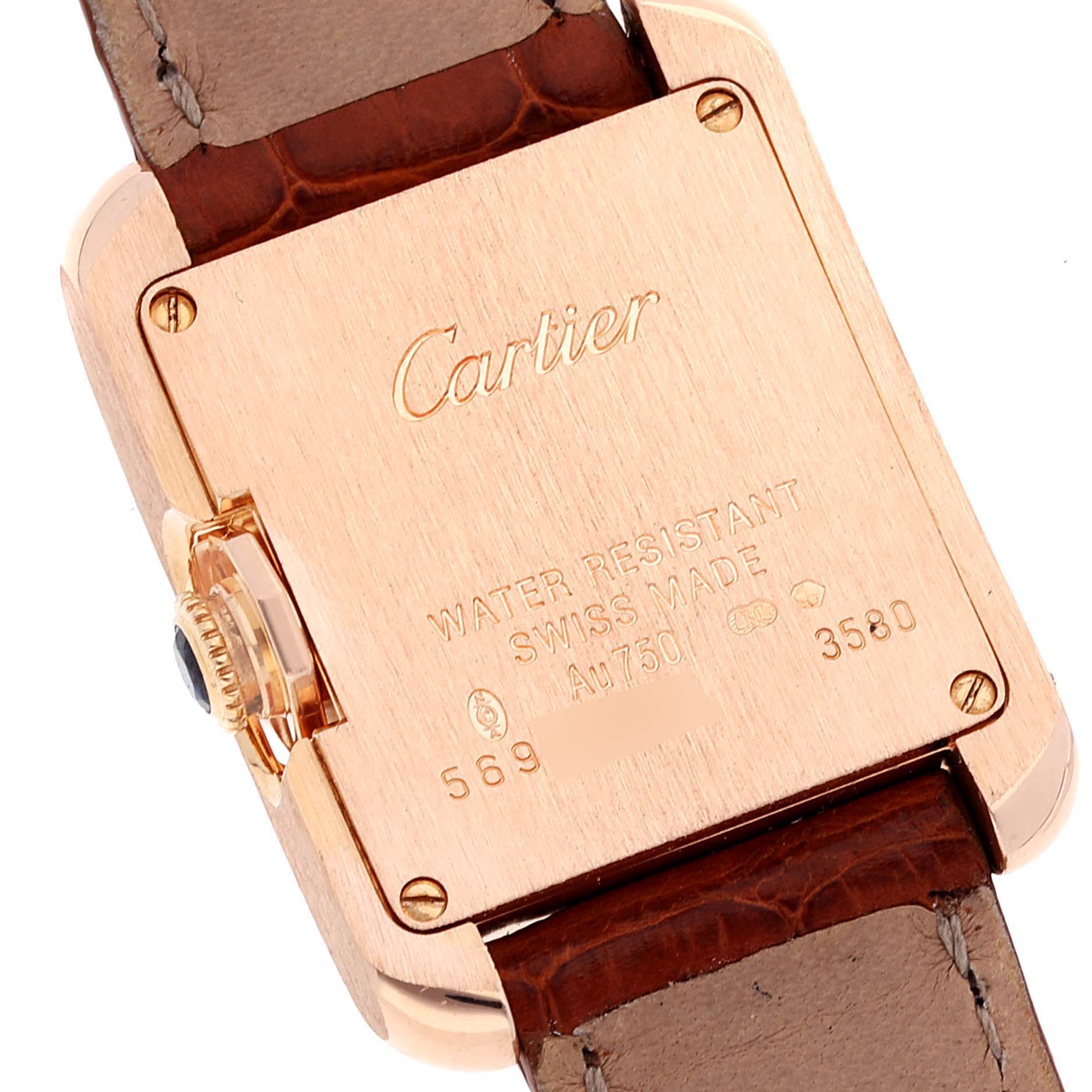This image shows the back case and part of the strap of a Cartier Tank Anglaise W5310027 Women
s Rose Gold Silver Dial W5310027 Women
s Rose Gold Silver Dial watch.