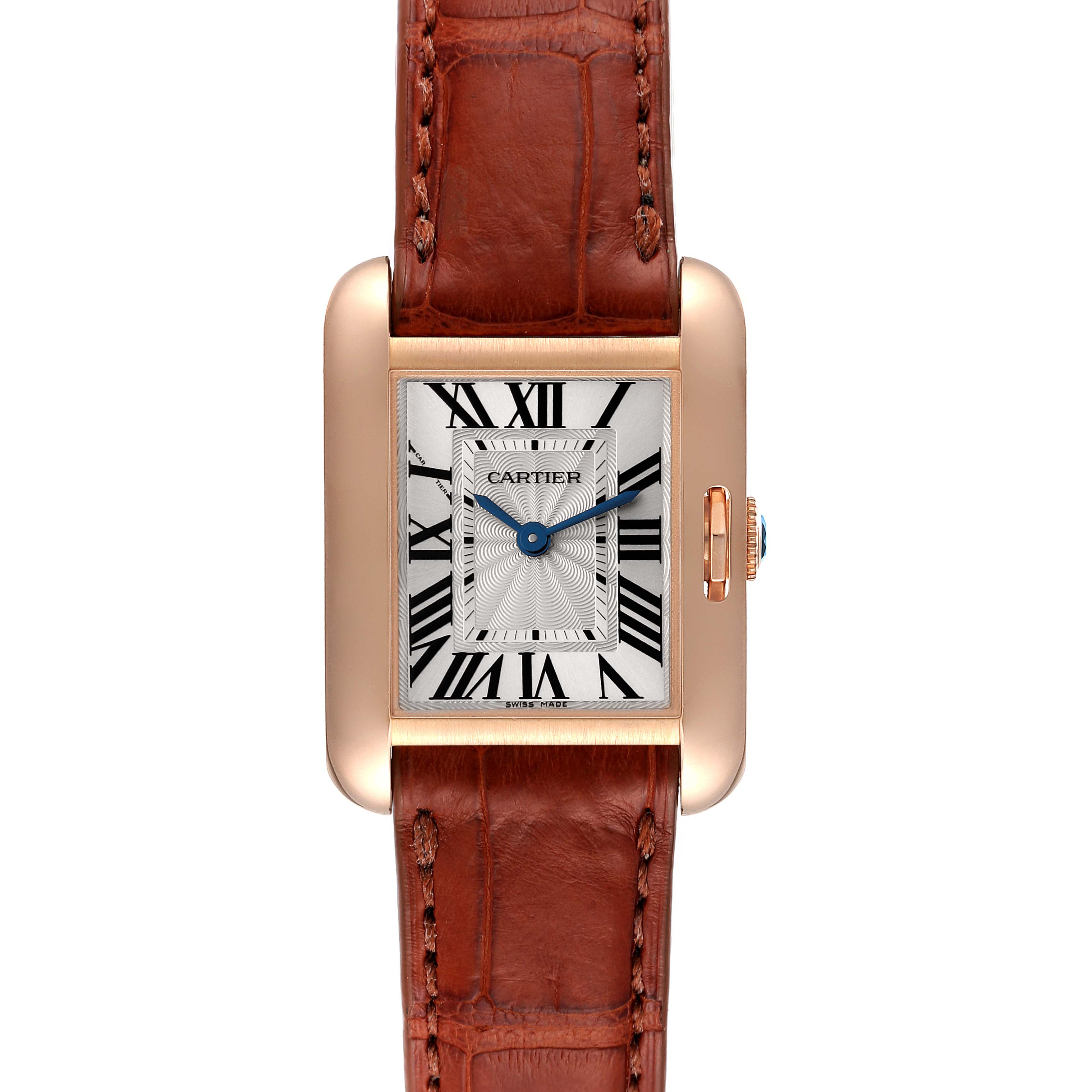 The Cartier Tank Anglaise W5310027 Women
s Rose Gold Silver Dial W5310027 Women
s Rose Gold Silver Dial watch is shown from the front, highlighting its face, Roman numerals, and brown leather band.
