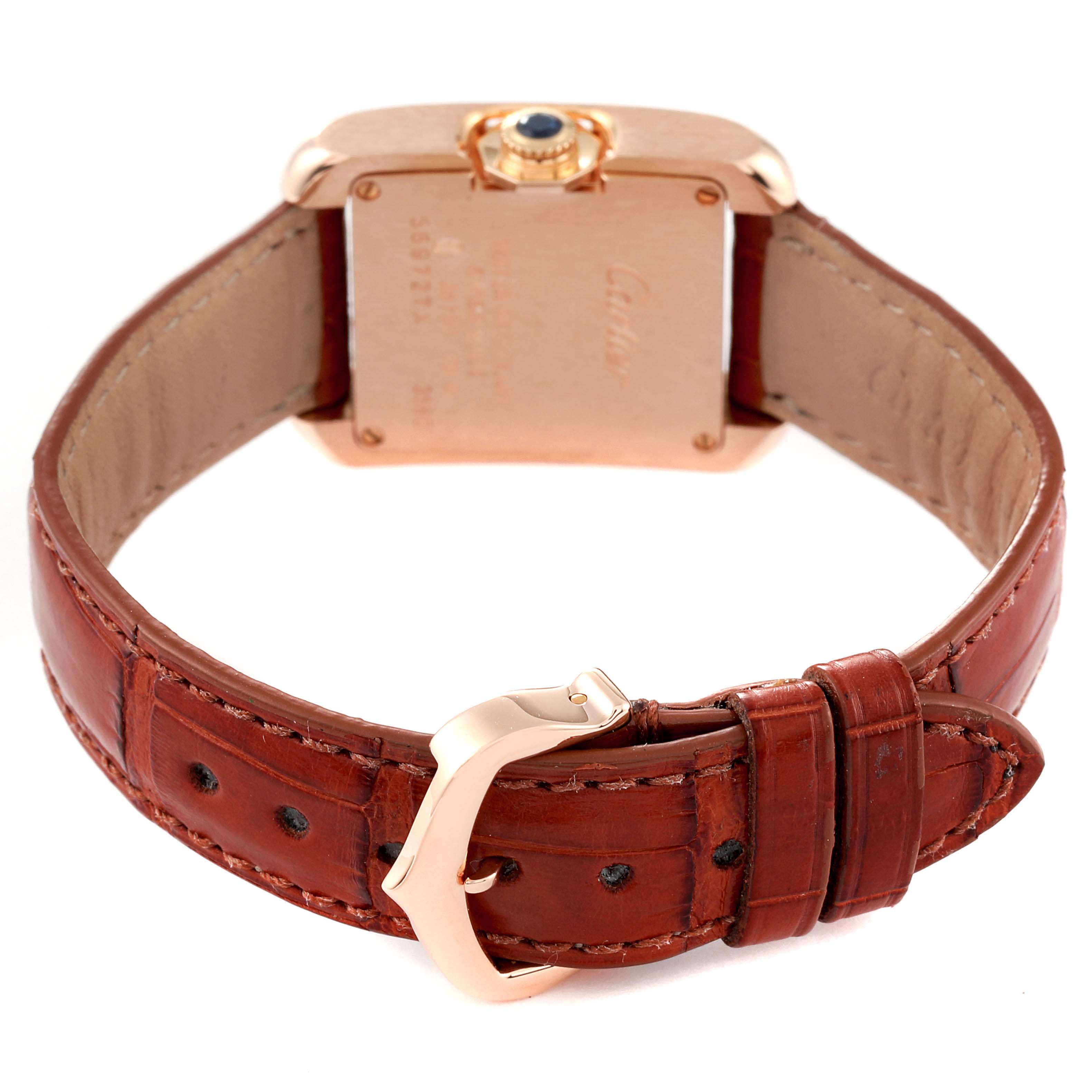This image shows the back of a Cartier Tank Anglaise W5310027 Women
s Rose Gold Silver Dial W5310027 Women
s Rose Gold Silver Dial watch, focusing on the case back, crown, and leather strap with a buckle.