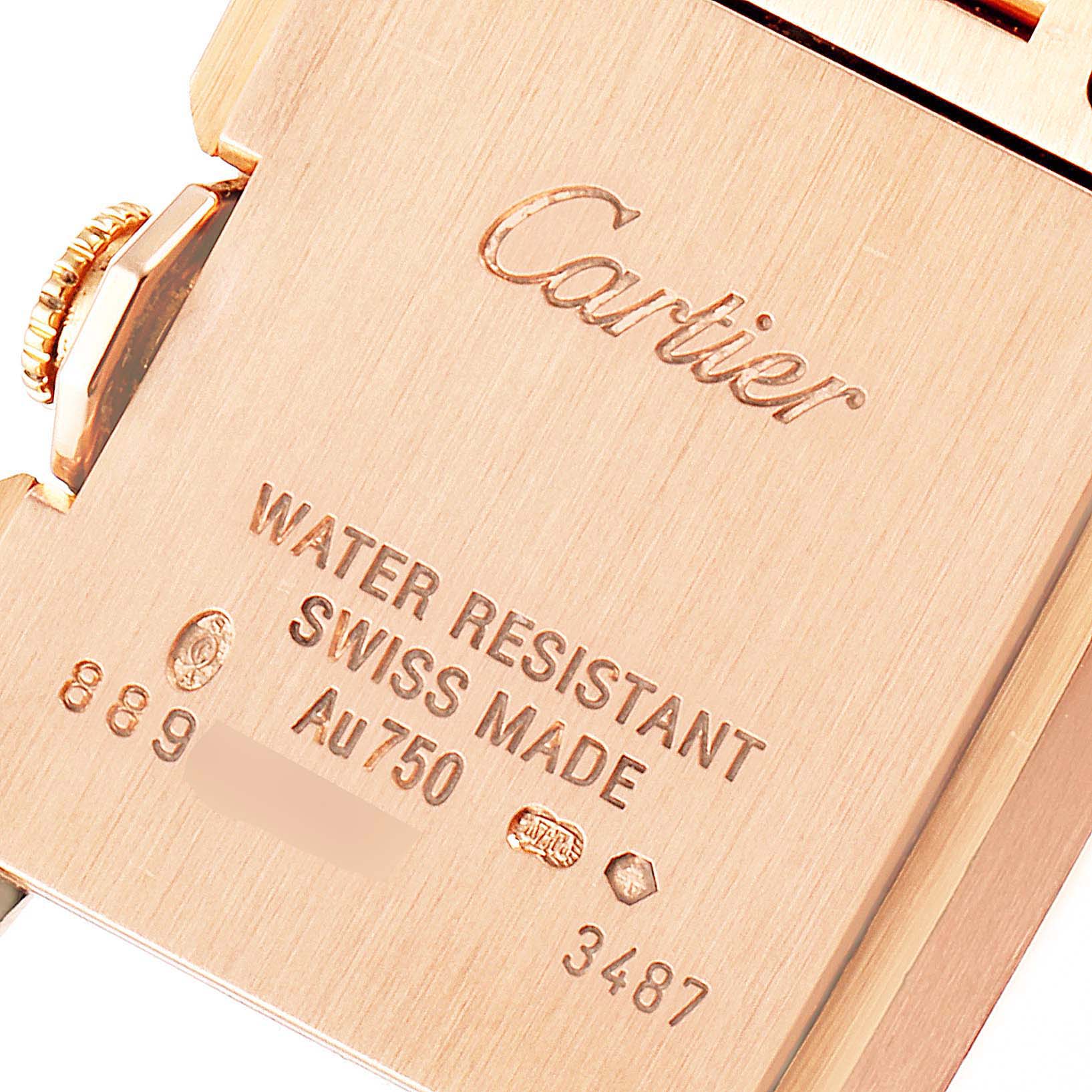 This image shows a close-up of the back case and crown of the Cartier Tank Anglaise W5310013 Women
s Rose Gold Silver Dial W5310013 Women
s Rose Gold Silver Dial watch.