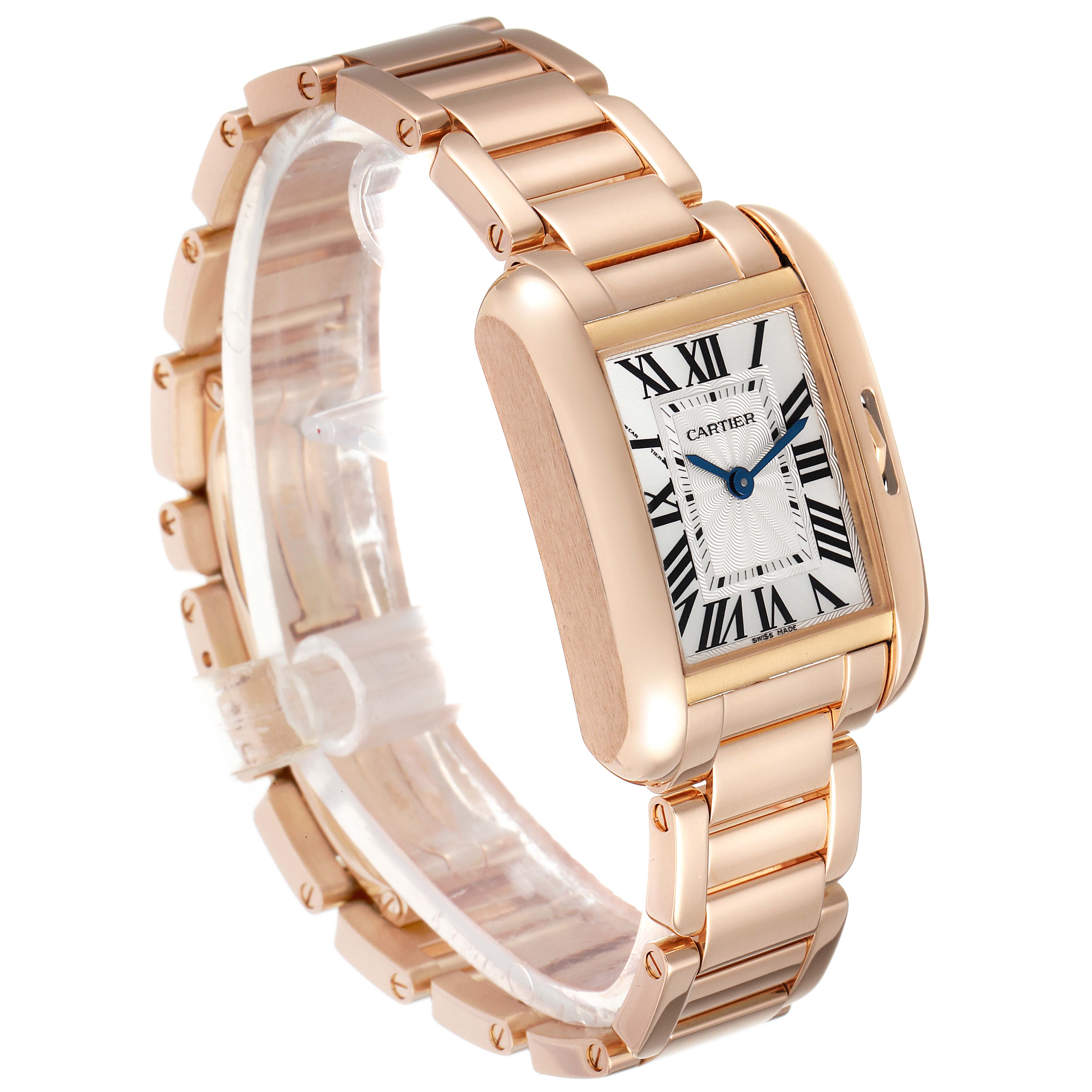 The Cartier Tank Anglaise W5310013 Women
s Rose Gold Silver Dial W5310013 Women
s Rose Gold Silver Dial watch is shown at an angle highlighting the face, bezel, and bracelet.