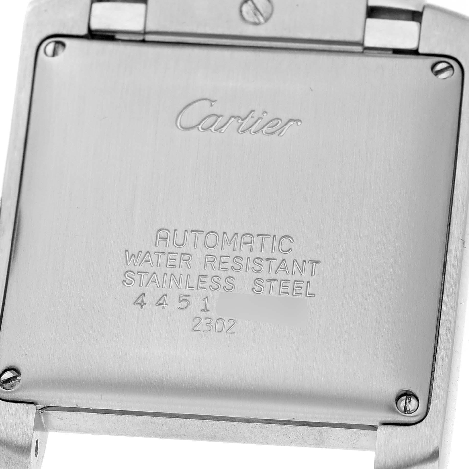The image shows the back of a Cartier Tank Française watch, highlighting its branding and specifications.