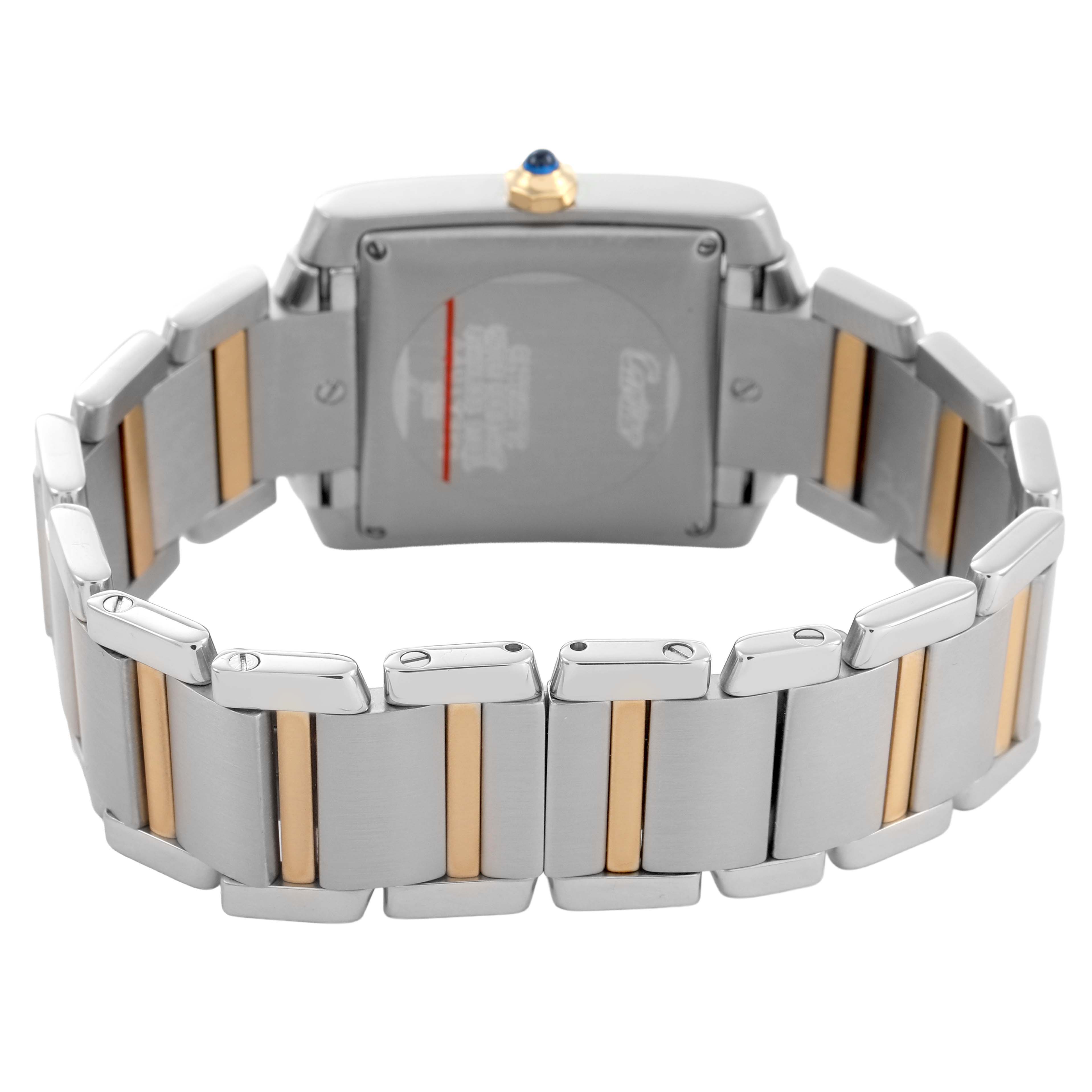 The image shows the back and bracelet of a Cartier Tank Française watch, highlighting its two-tone metal links and case back.