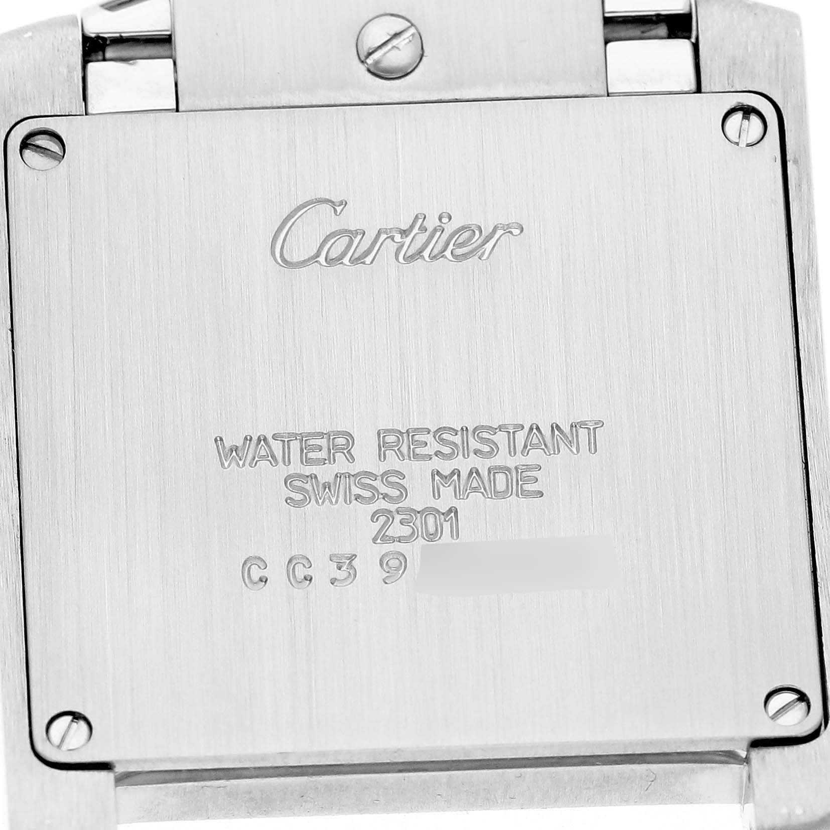 The image shows the back of a Cartier Tank Francaise W51003Q3 Women's Stainless Steel Silver Dial watch, highlighting the brand engraving and water resistance details.