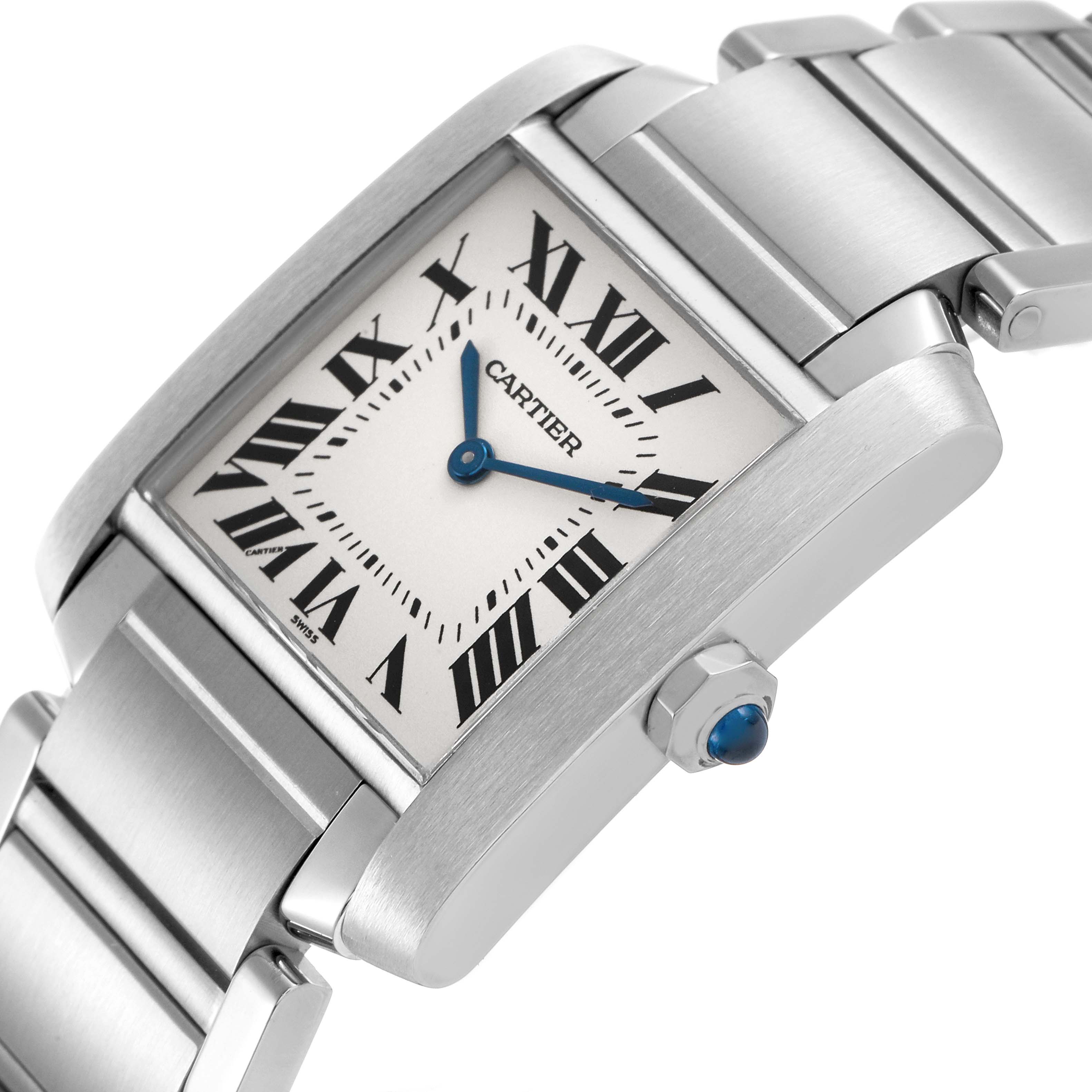 The Cartier Tank Française watch is shown from an angled side view, highlighting its dial, Roman numerals, and metal bracelet.