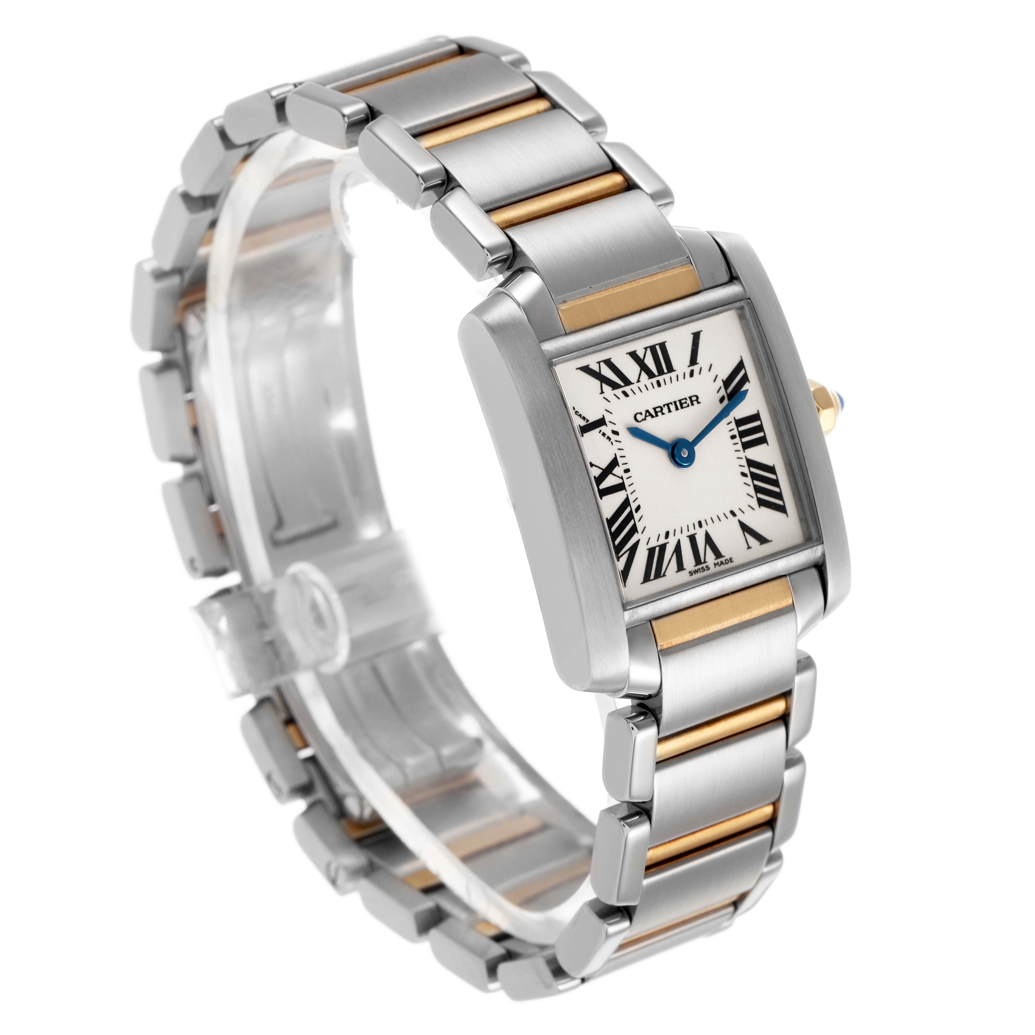 The Cartier Tank Française watch is shown at a three-quarter angle, highlighting its rectangular face, silver and gold bracelet, and Roman numeral dial.