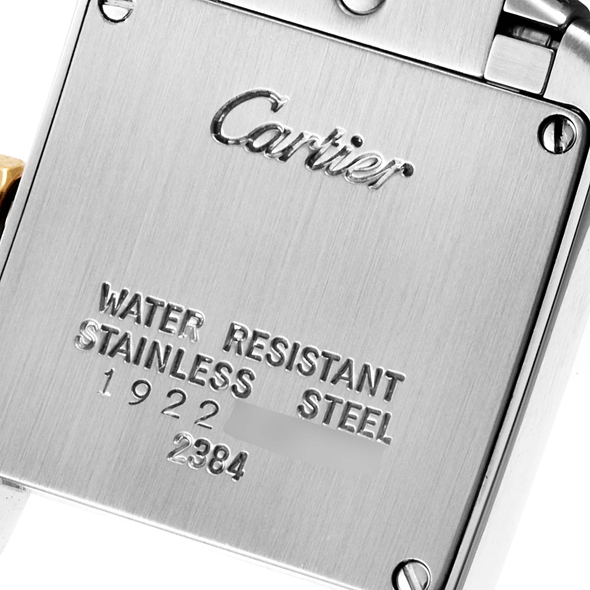 The image shows the back side of a Cartier Tank Francaise W51007Q4 Women's Steel and Gold (two tone) Silver Dial W51007Q4 Women's Steel and Gold (two tone) Silver Dial watch, highlighting its branding, material, and water resistance details.