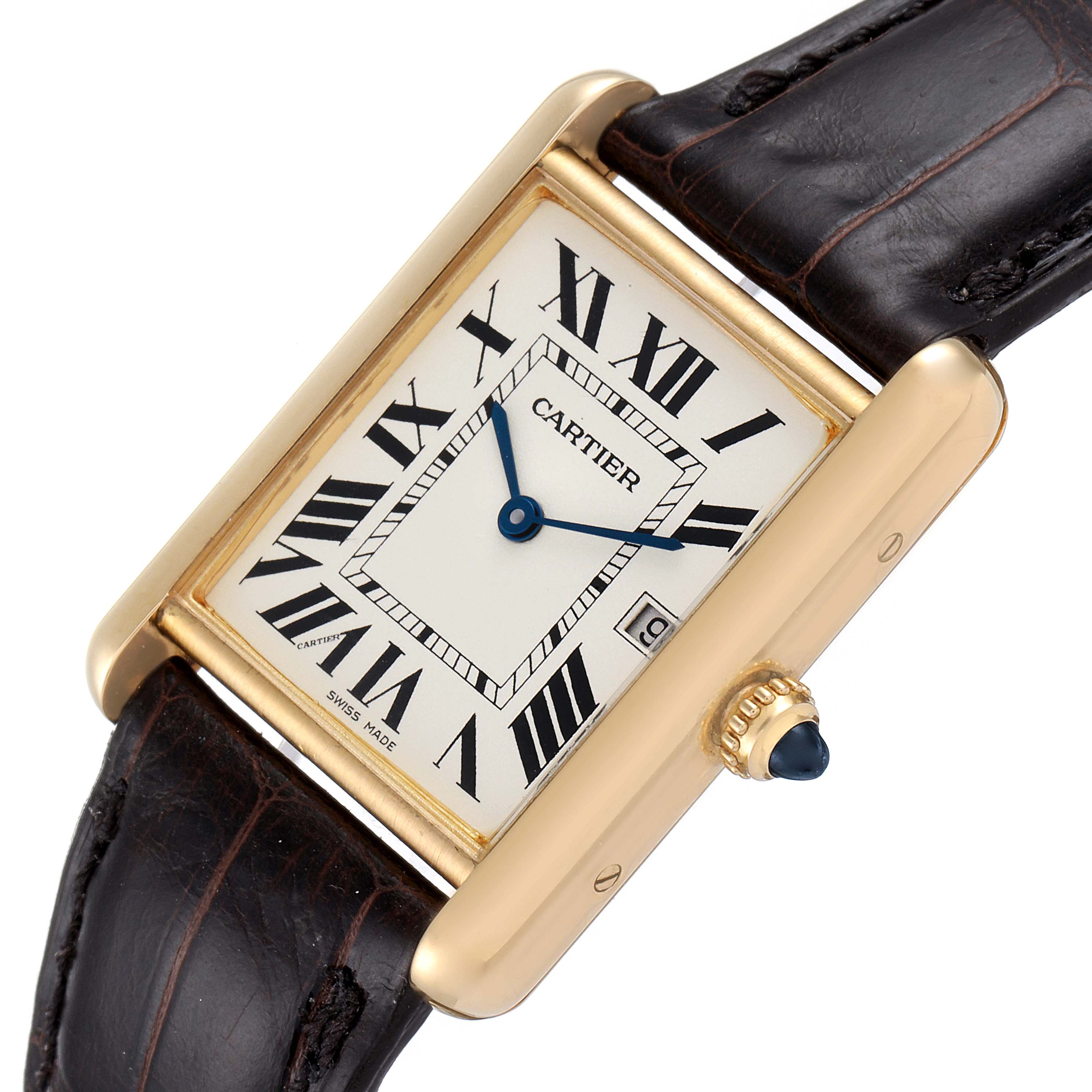 The Cartier Tank Louis W1529756 Men
s Yellow Gold Silver Dial W1529756 Men
s Yellow Gold Silver Dial watch is shown at a slight angle, displaying its rectangular face, Roman numerals, and leather strap.