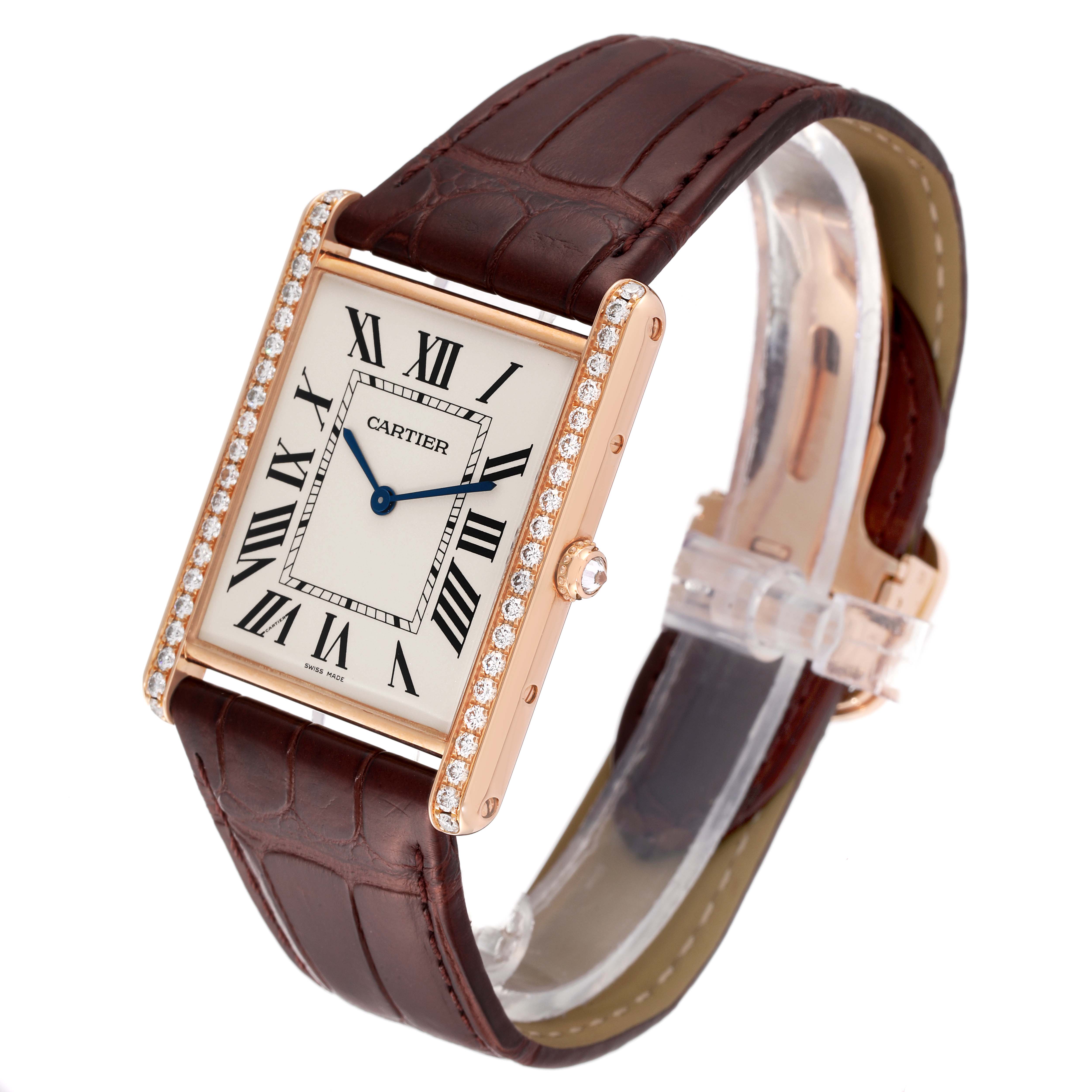 The Cartier Tank Louis WT200005 Men's Rose Gold Silver Dial WT200005 Men's Rose Gold Silver Dial watch is shown at a three-quarter angle, displaying its rectangular dial, diamond-studded bezel, and brown leather strap.
