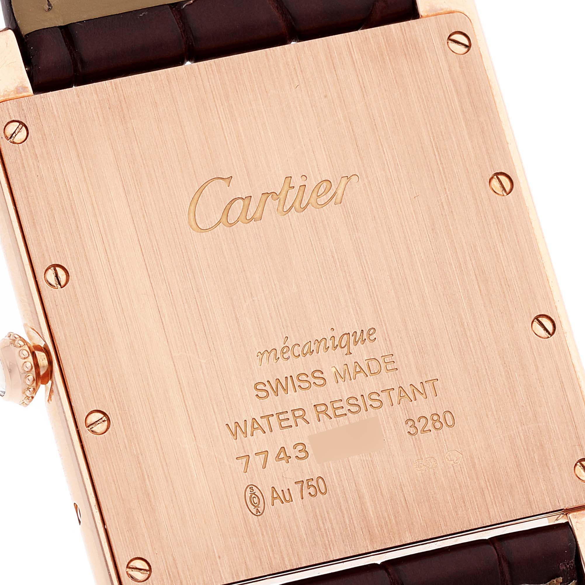 The image shows the case back of a Cartier Tank Louis WT200005 Men's Rose Gold Silver Dial WT200005 Men's Rose Gold Silver Dial watch, highlighting inscriptions and details.