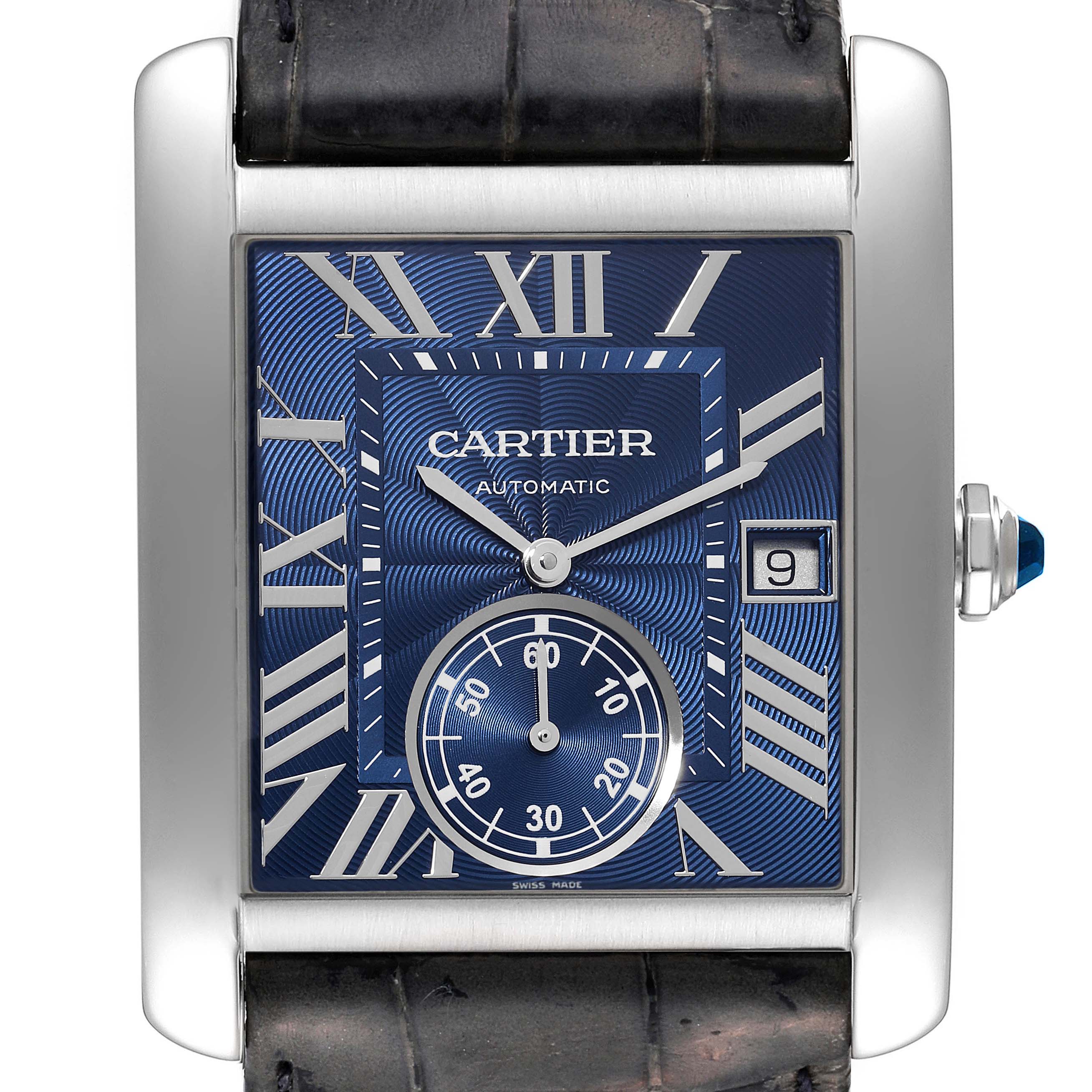 The image shows the front view of the Cartier Tank MC WSTA0010 Men's Stainless Steel Blue Dial WSTA0010 Men's Stainless Steel Blue Dial watch, highlighting the dial, hands, date window, and part of the strap.