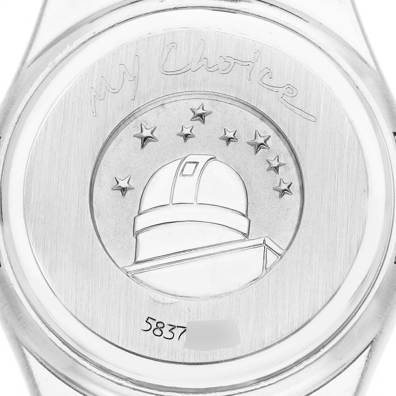 The image shows the back casing of the Omega watch model 1267.75.00, featuring an embossed observatory and stars design, along with engraved text and numbers.