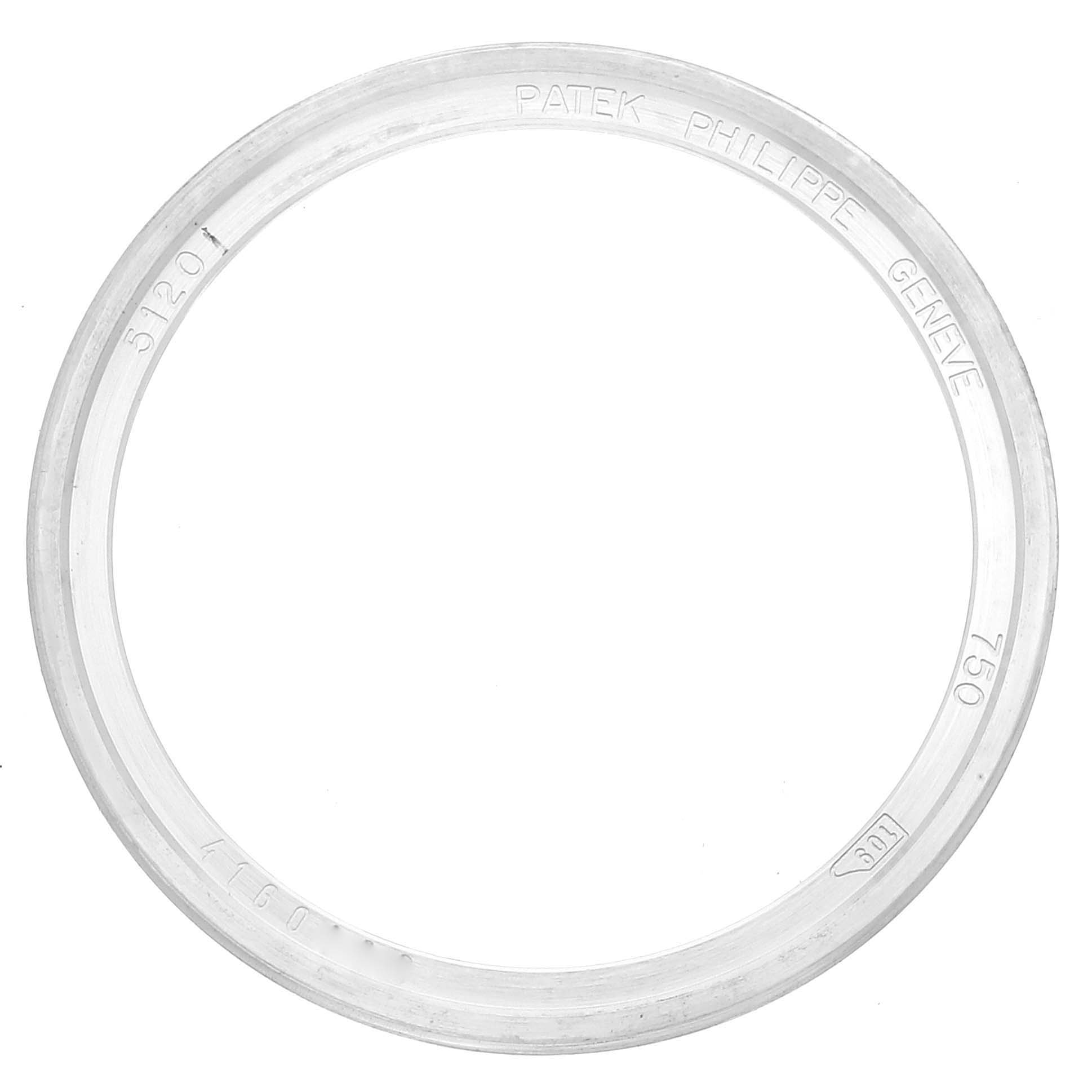 The image shows the bezel of a Patek Philippe Calatrava 5120G Men's White Gold White Dial 5120G Men's White Gold White Dial watch from a top-down angle.