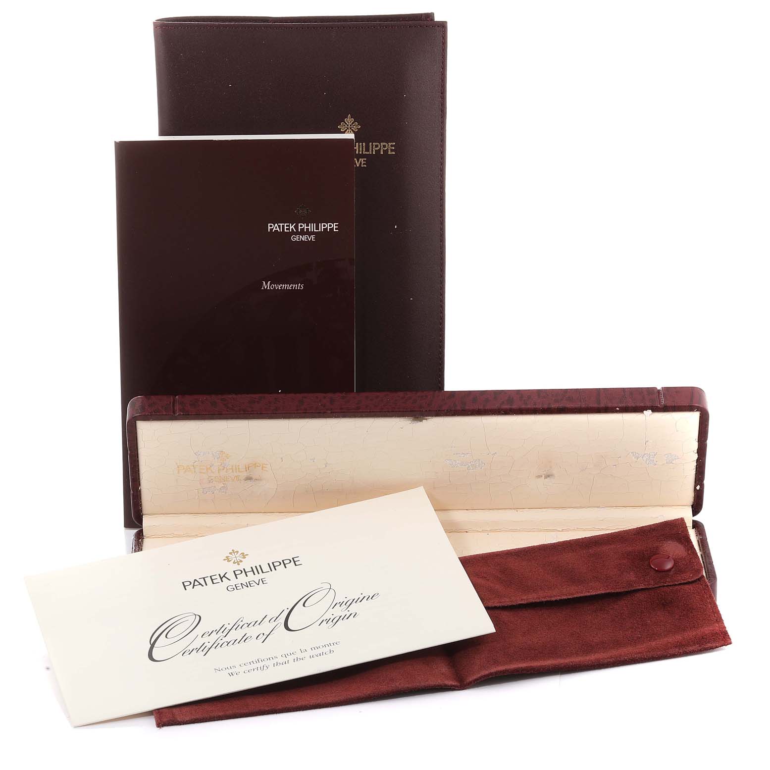 The image shows the packaging, booklet, and Certificate of Origin for a Patek Philippe Calatrava 5120G Men's White Gold White Dial 5120G Men's White Gold White Dial watch.