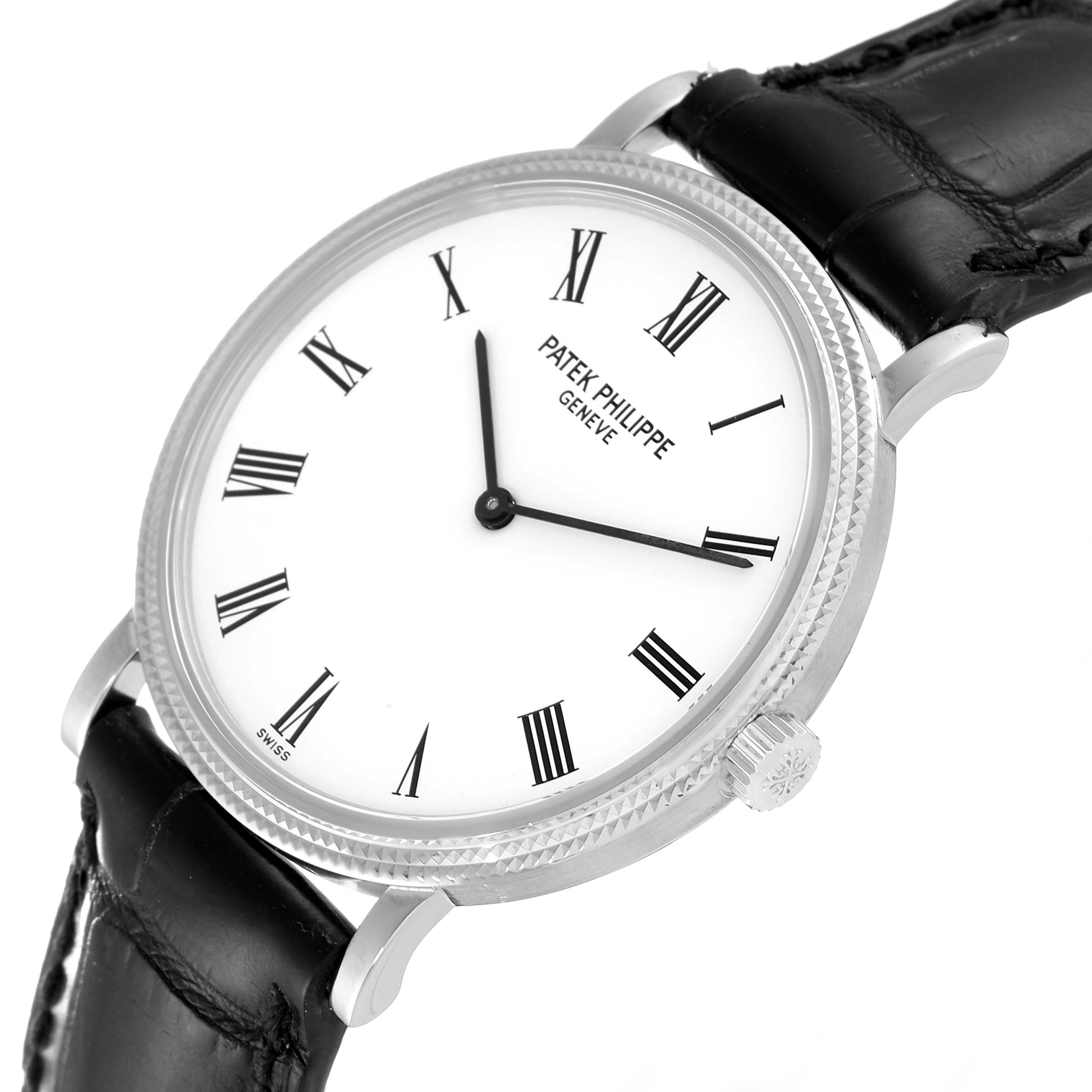 The image shows a Patek Philippe Calatrava 5120G Men's White Gold White Dial 5120G Men's White Gold White Dial watch at an angled close-up, highlighting its face, crown, and a part of the leather strap.