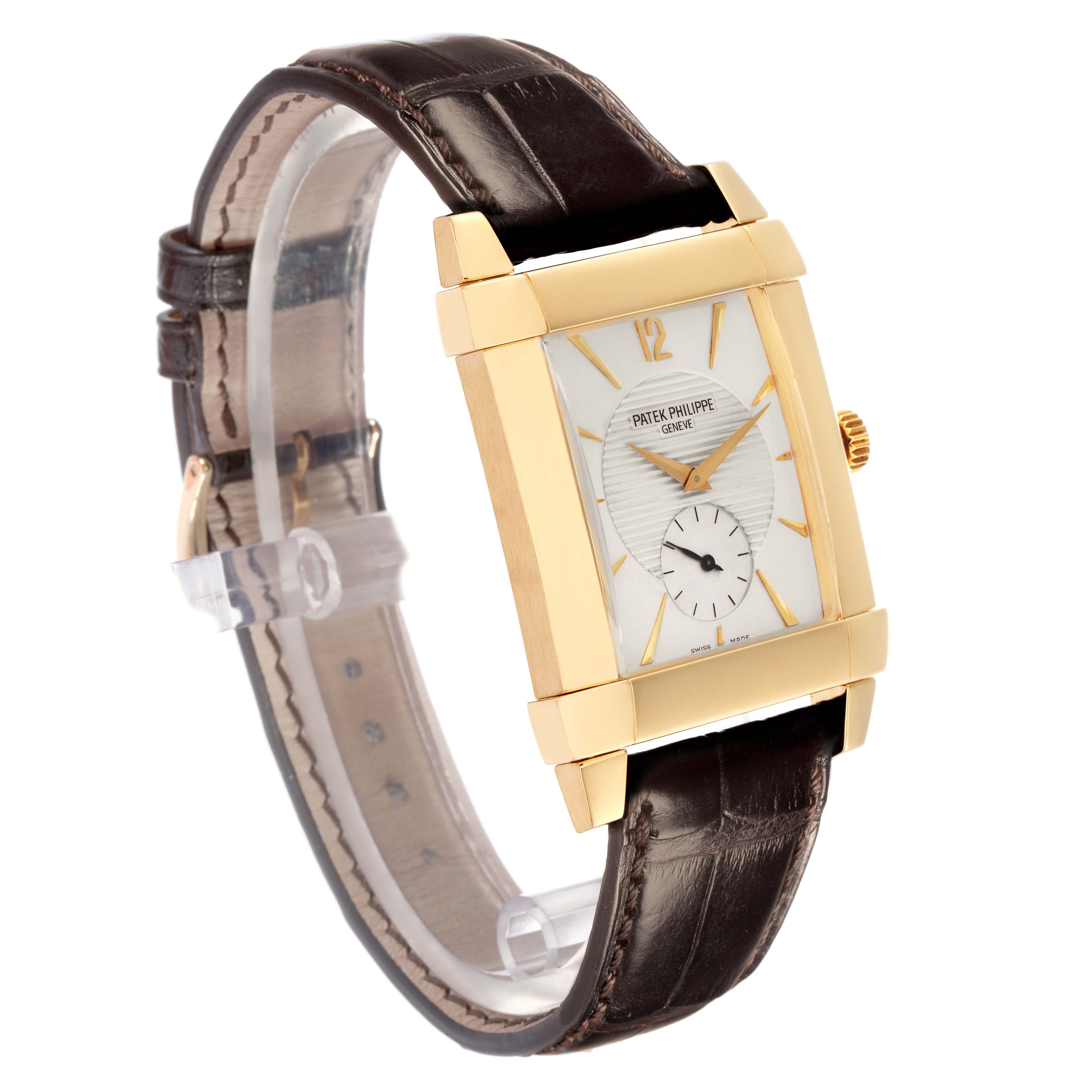 The image shows a Patek Philippe Gondolo model 5111J men's watch, captured at an angled side view displaying the rectangular dial, strap, and crown.