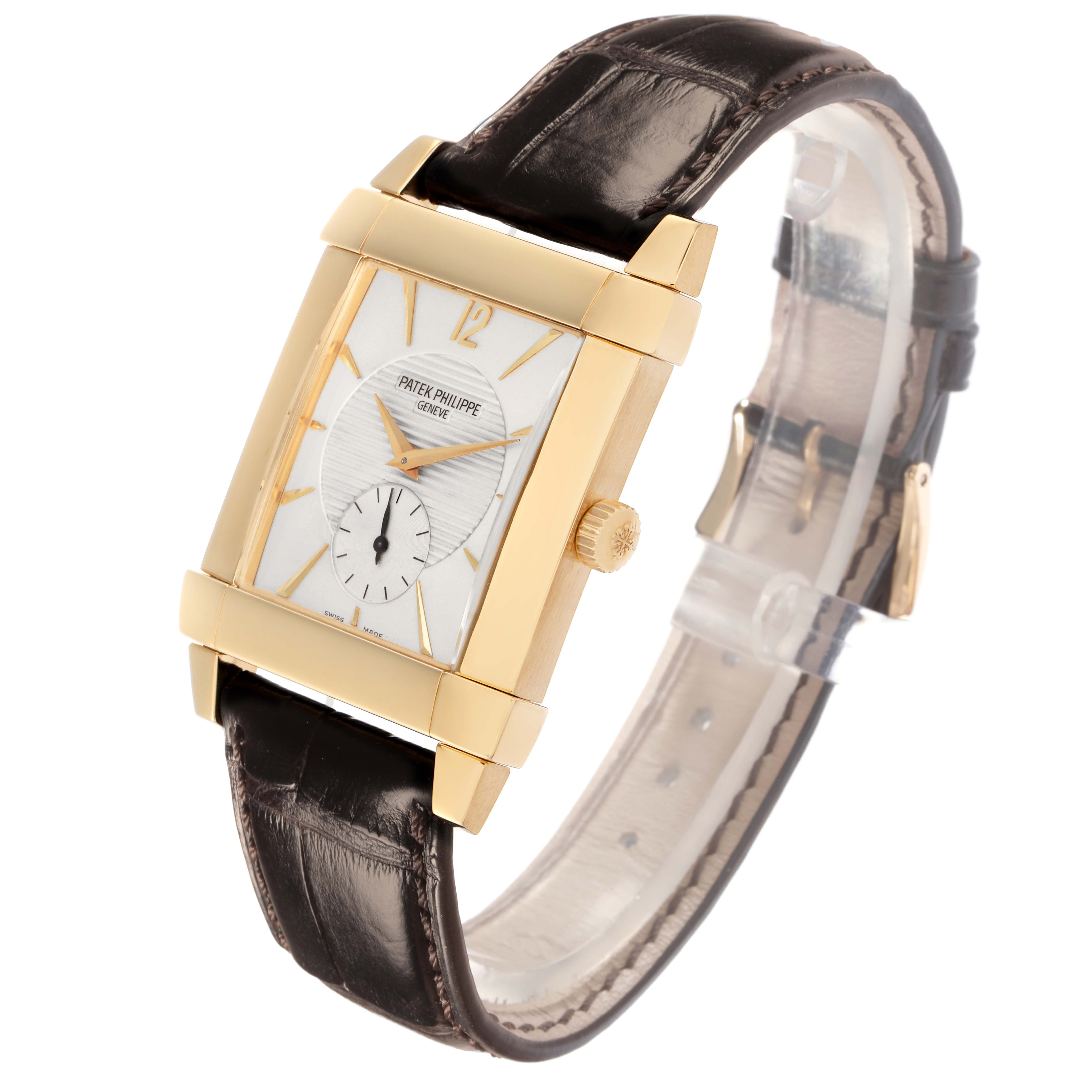 The Patek Philippe Gondolo Model 5111J is shown angled slightly from the side, highlighting its gold rectangular case, crown, white dial, and leather strap.