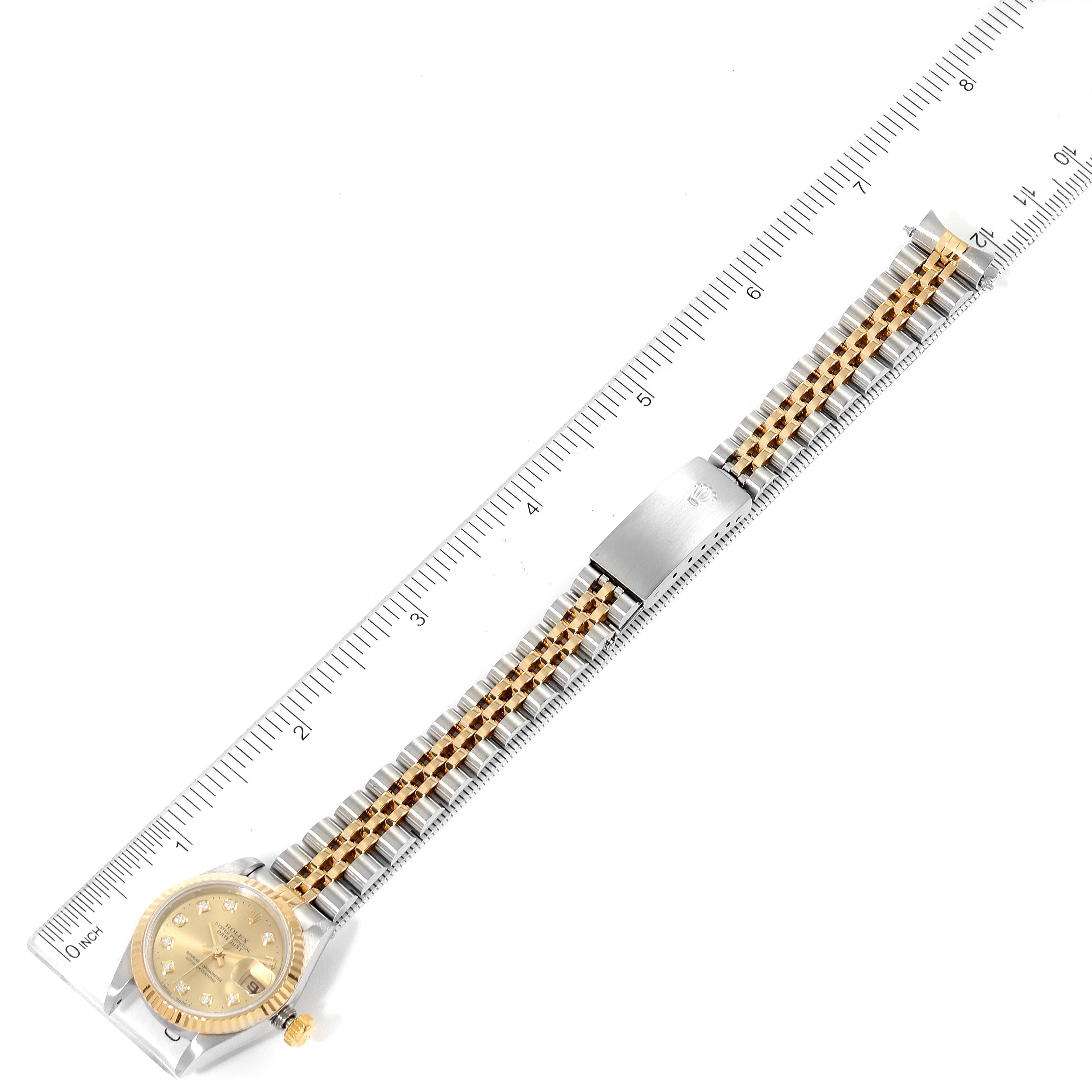 The image shows a Rolex Datejust 69173 Women's Steel and Gold (two tone) Champagne Dial 69173 Women's Steel and Gold (two tone) Champagne Dial watch from an overhead angle, displaying the full watch including the bracelet and dial.