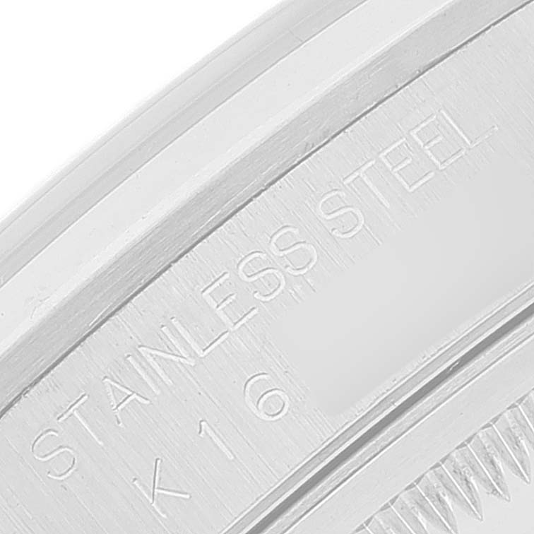 This is a close-up of the case back of a Rolex Datejust 16200 Men
s Stainless Steel Pink Dial 16200 Men
s Stainless Steel Pink Dial model, showing "STAINLESS STEEL" engraving.