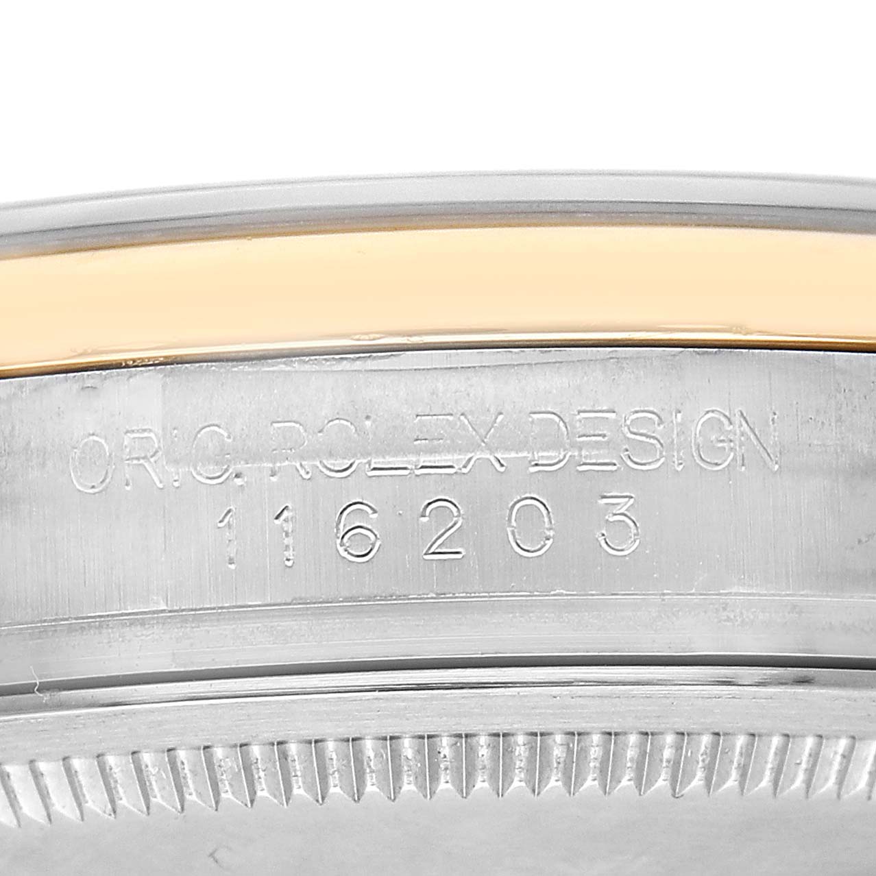The image shows a close-up of the side of a Rolex Datejust 116203 Men's Steel and Gold (two tone) Champagne Dial watch, highlighting the engraved design and model number.
