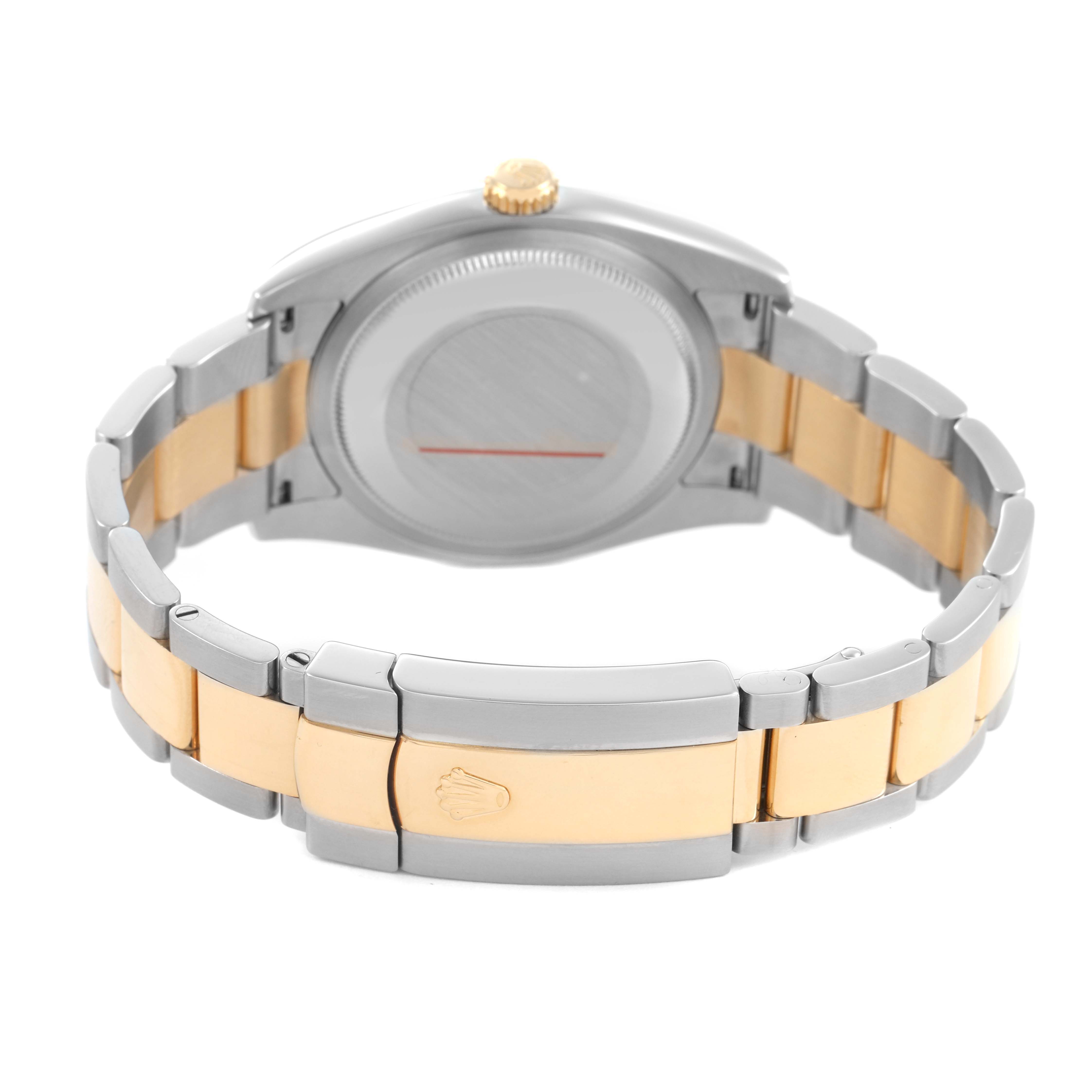 The image shows the back of a Rolex Datejust 116203 Men's Steel and Gold (two tone) Champagne Dial watch, highlighting the case back and two-tone bracelet with a clasp.