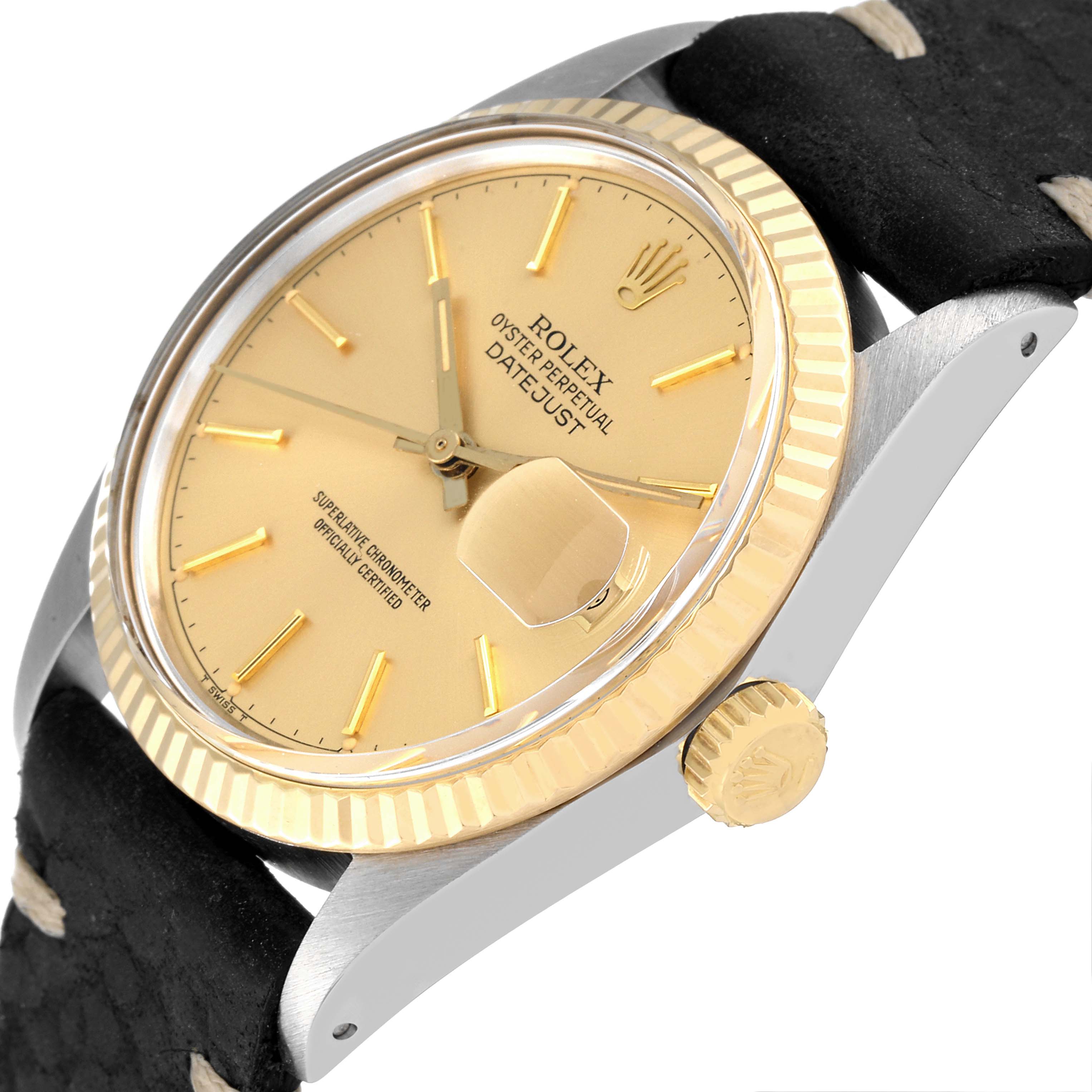 This image shows a close-up view of the dial, bezel, and crown of the Rolex Vintage Collection 16013 Men's Steel and Gold (two tone) Champagne Dial 16013 Men's Steel and Gold (two tone) Champagne Dial Datejust watch.