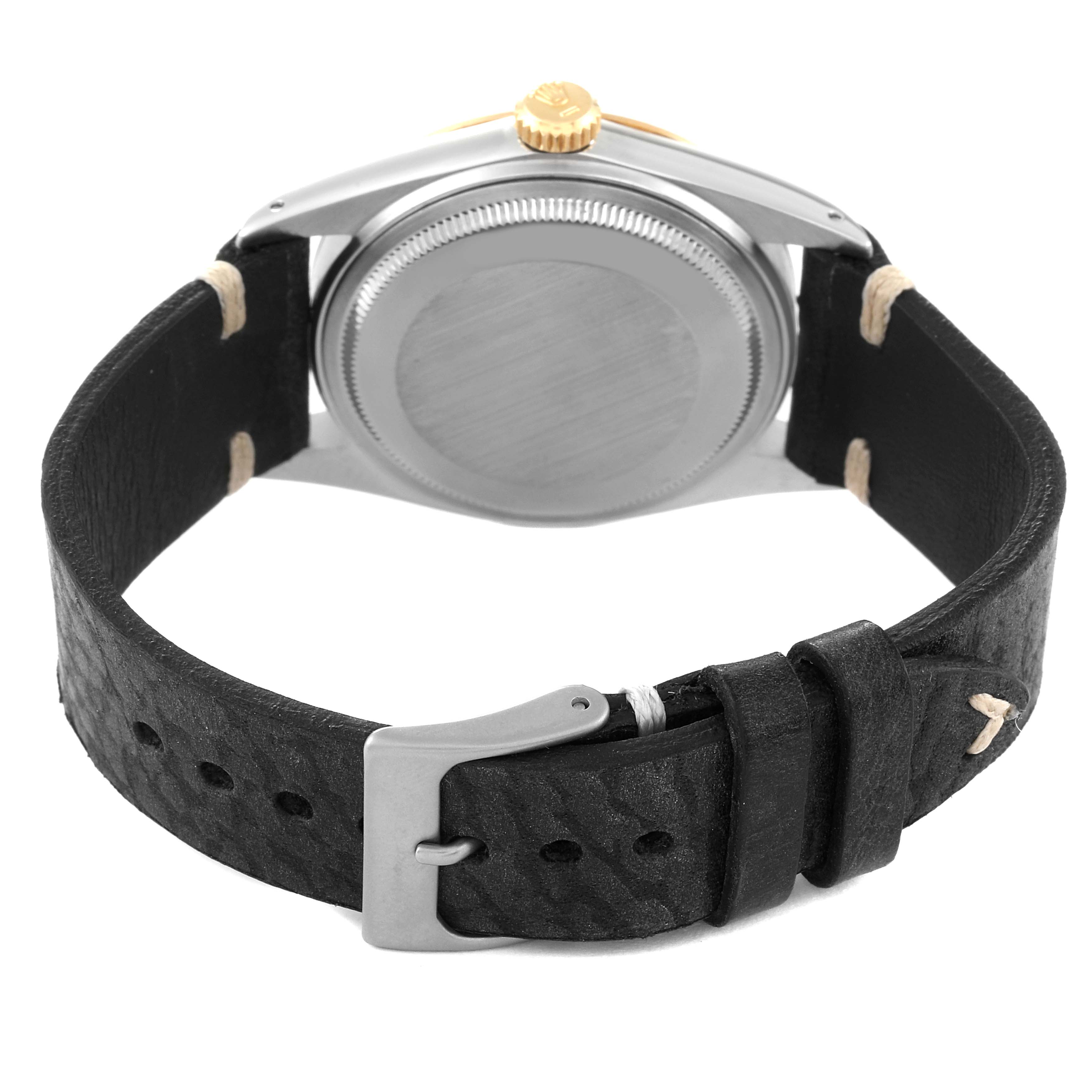 The image shows the back case and leather strap with a buckle of the Rolex Vintage Collection 16013 Men's Steel and Gold (two tone) Champagne Dial 16013 Men's Steel and Gold (two tone) Champagne Dial model watch.