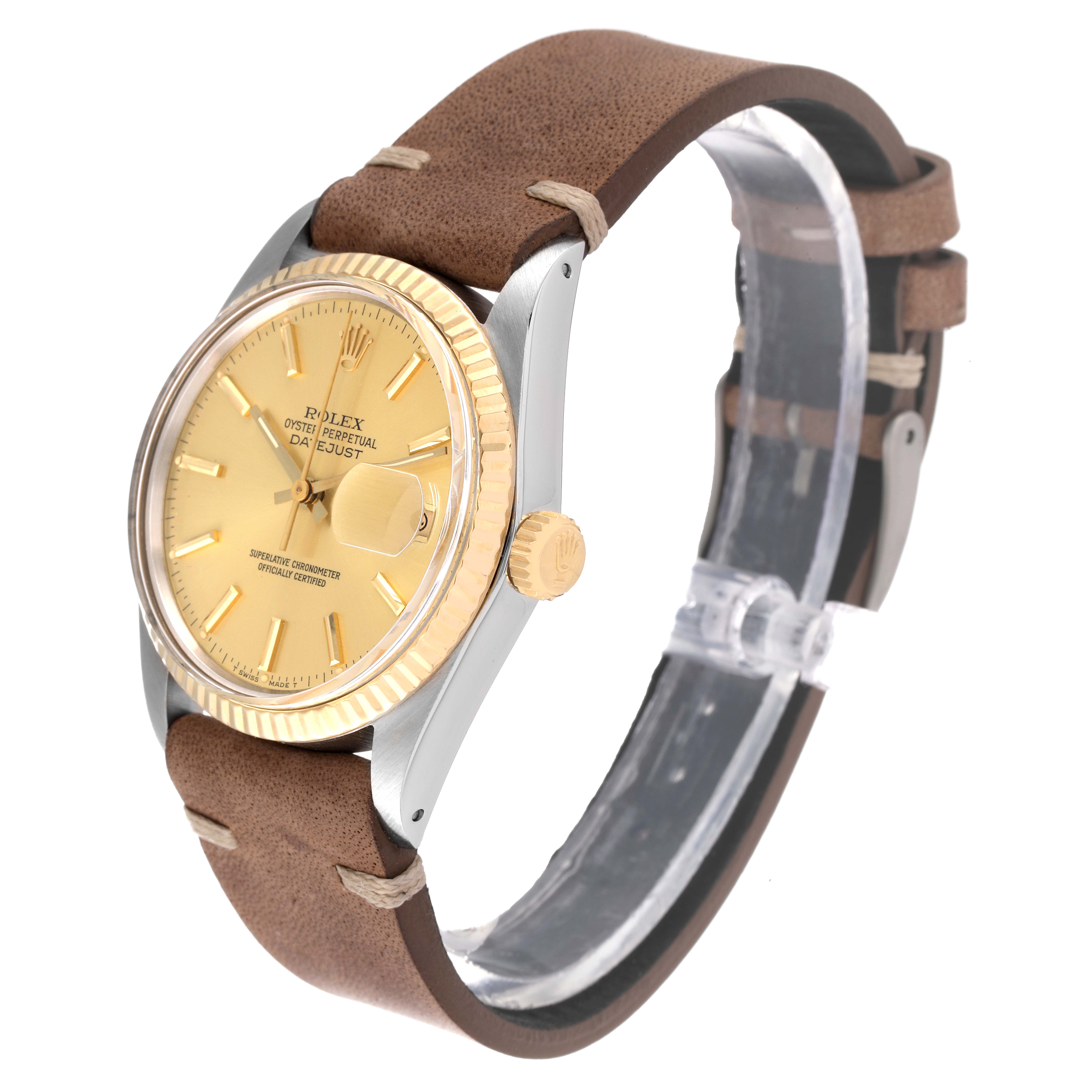 This image shows a side angle of the Rolex Vintage Collection 16013 Men's Steel and Gold (two tone) Champagne Dial 16013 Men's Steel and Gold (two tone) Champagne Dial model, highlighting the face, crown, and leather strap.