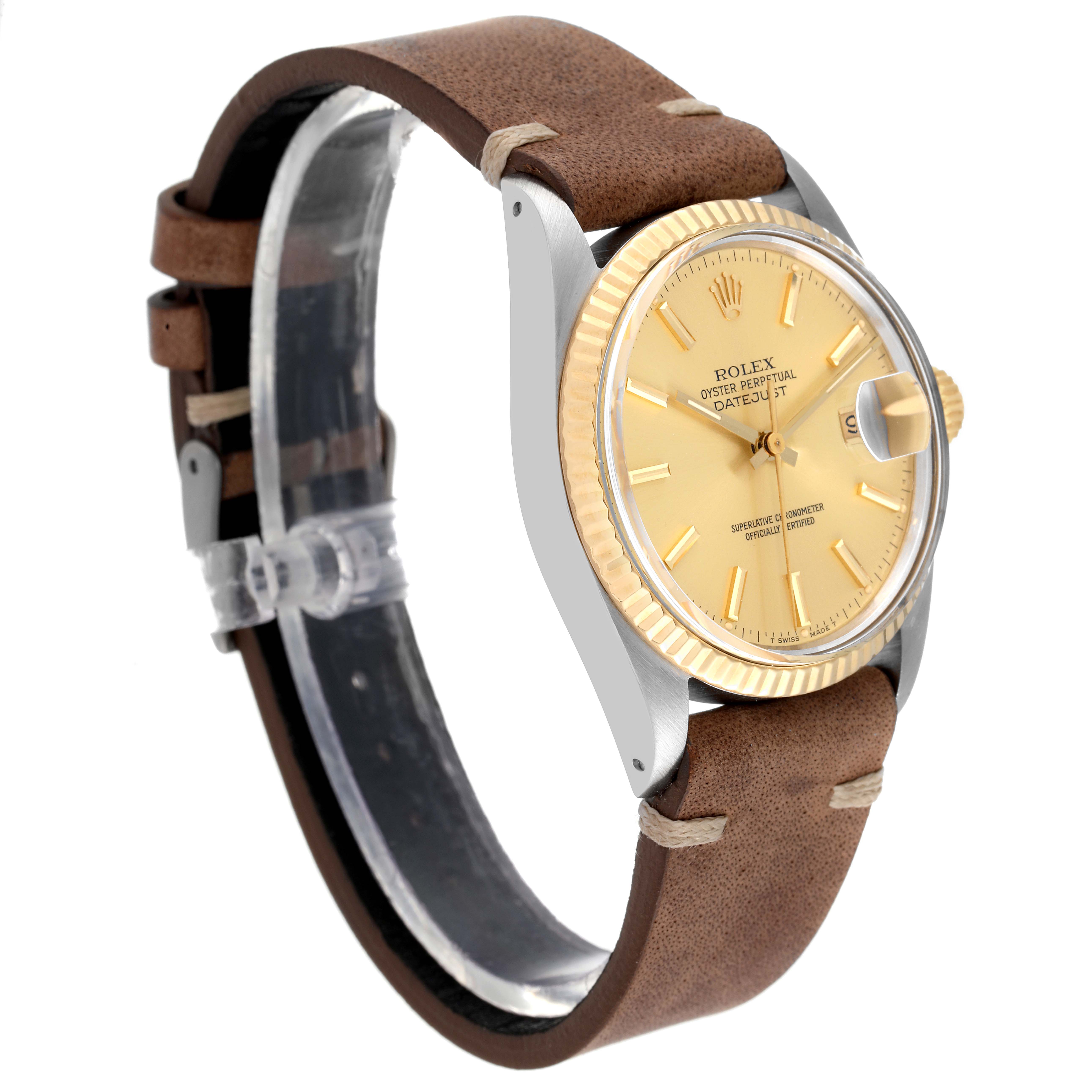 The Rolex Vintage Collection 16013 Men's Steel and Gold (two tone) Champagne Dial 16013 Men's Steel and Gold (two tone) Champagne Dial watch is shown in a side angle, highlighting its tan leather strap, gold bezel, and champagne dial.