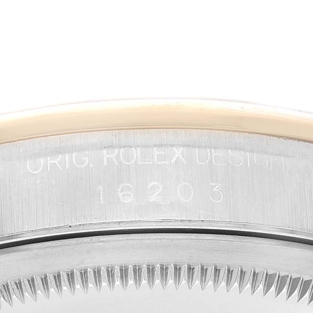 This close-up image shows the bezel and case side of a Rolex Datejust 16203 Men's Steel and Gold (two tone) Grey Dial 16203 Men's Steel and Gold (two tone) Grey Dial, displaying the model number 16203.