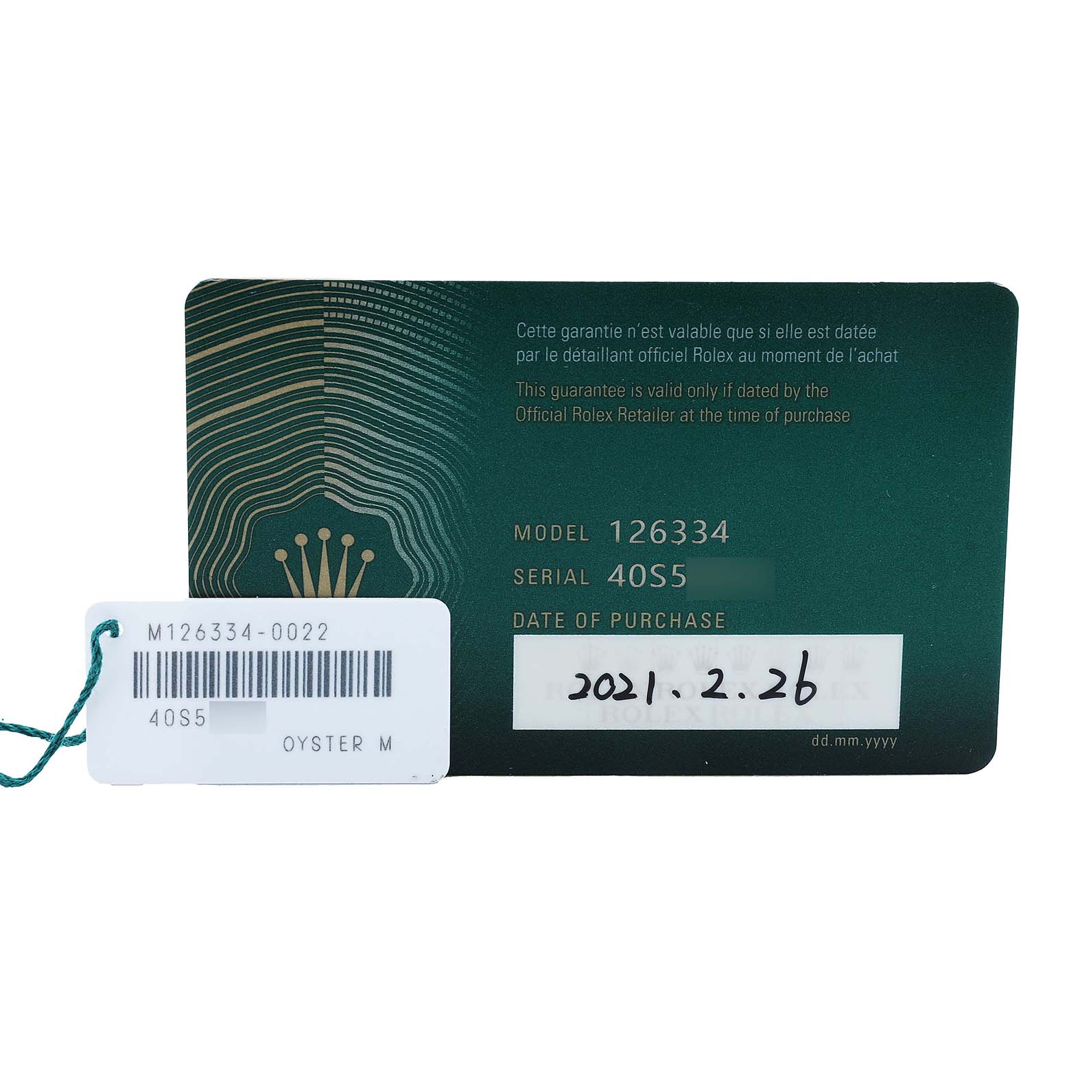 The image shows the warranty card and tag of a Rolex Datejust 41 126334 Men's Stainless Steel Grey Dial, displaying model and serial numbers.