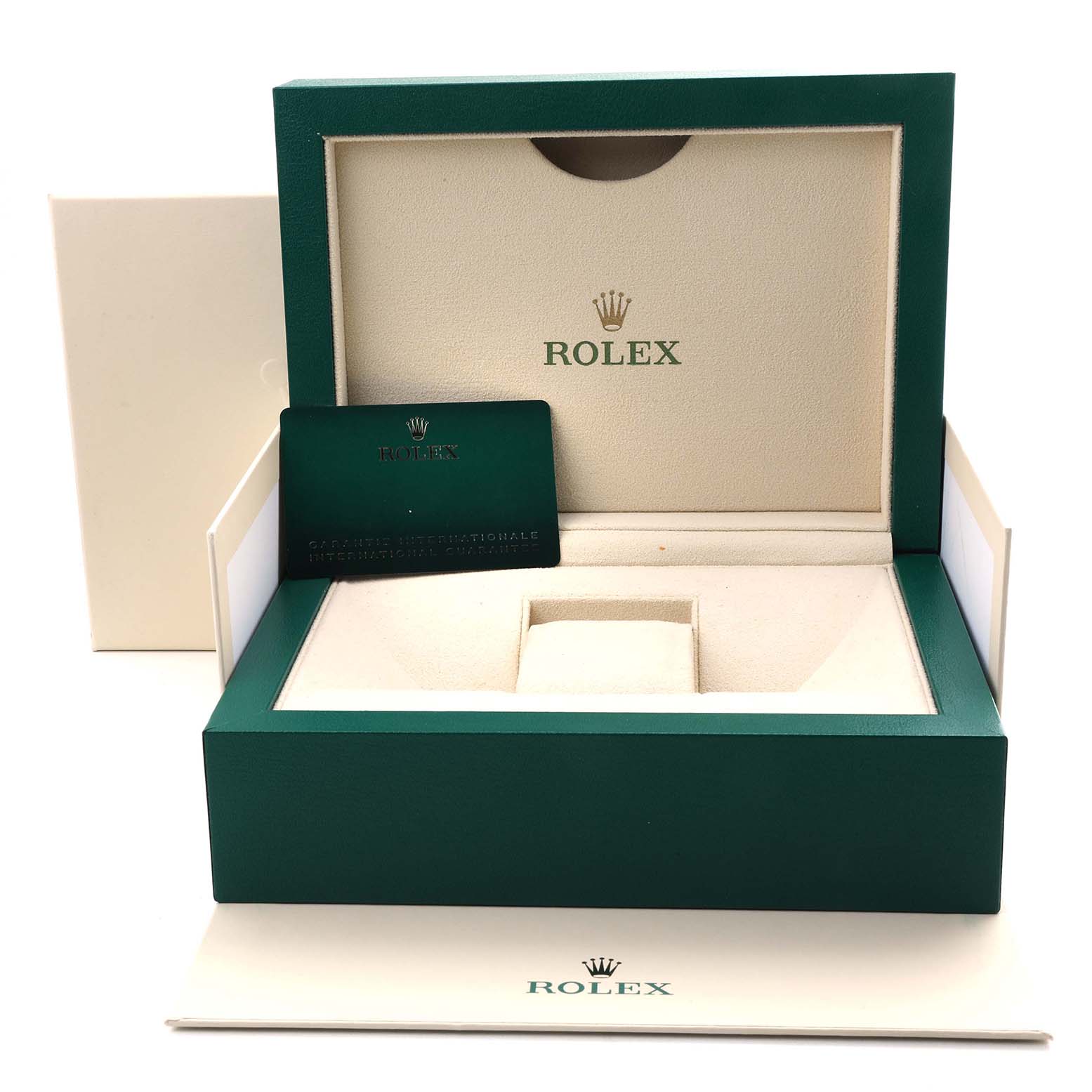 The image shows an open green and beige Rolex box for the Datejust 41 model, including a warranty card and outer packaging.