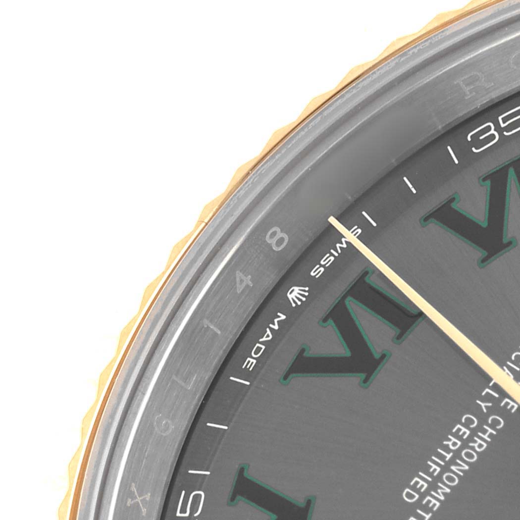 This image shows a close-up of the Rolex Datejust 41 126333 Men's Steel and Gold (two tone) Grey Dial's watch face, highlighting the Roman numerals, minute markers, and part of the bezel.