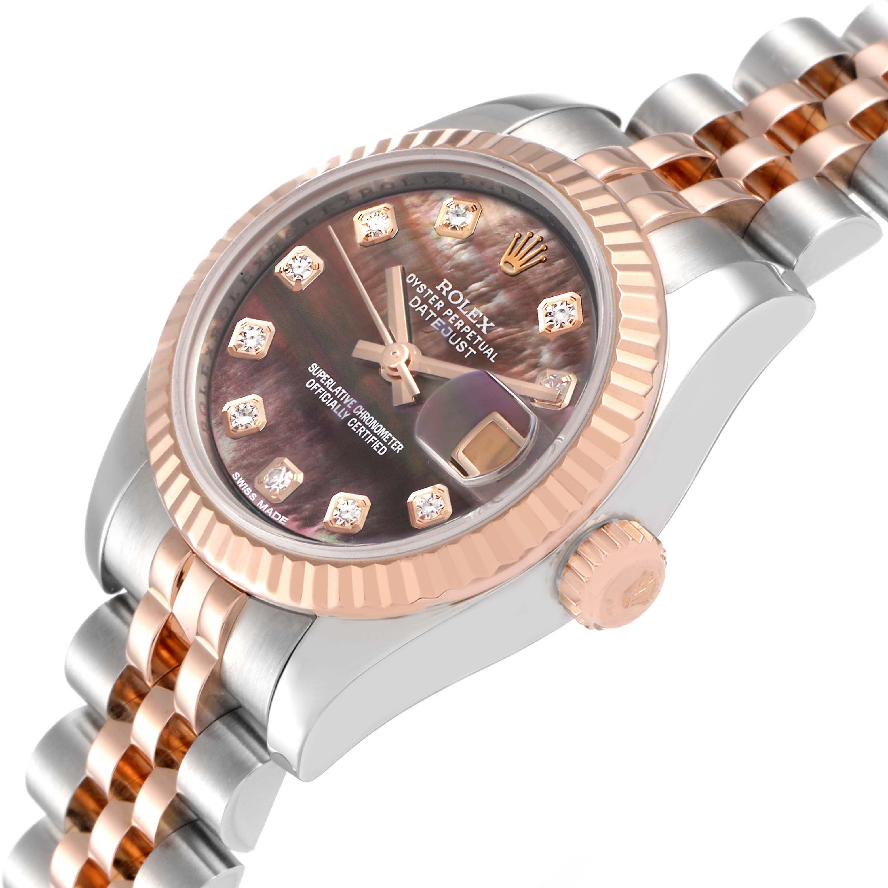 The image shows a close-up angle of a Rolex Datejust 179171 Women's Steel and Gold (two tone) Mother of Pearl Dial 179171 Women's Steel and Gold (two tone) Mother of Pearl Dial watch, highlighting its dial, bezel, crown, and two-tone bracelet.