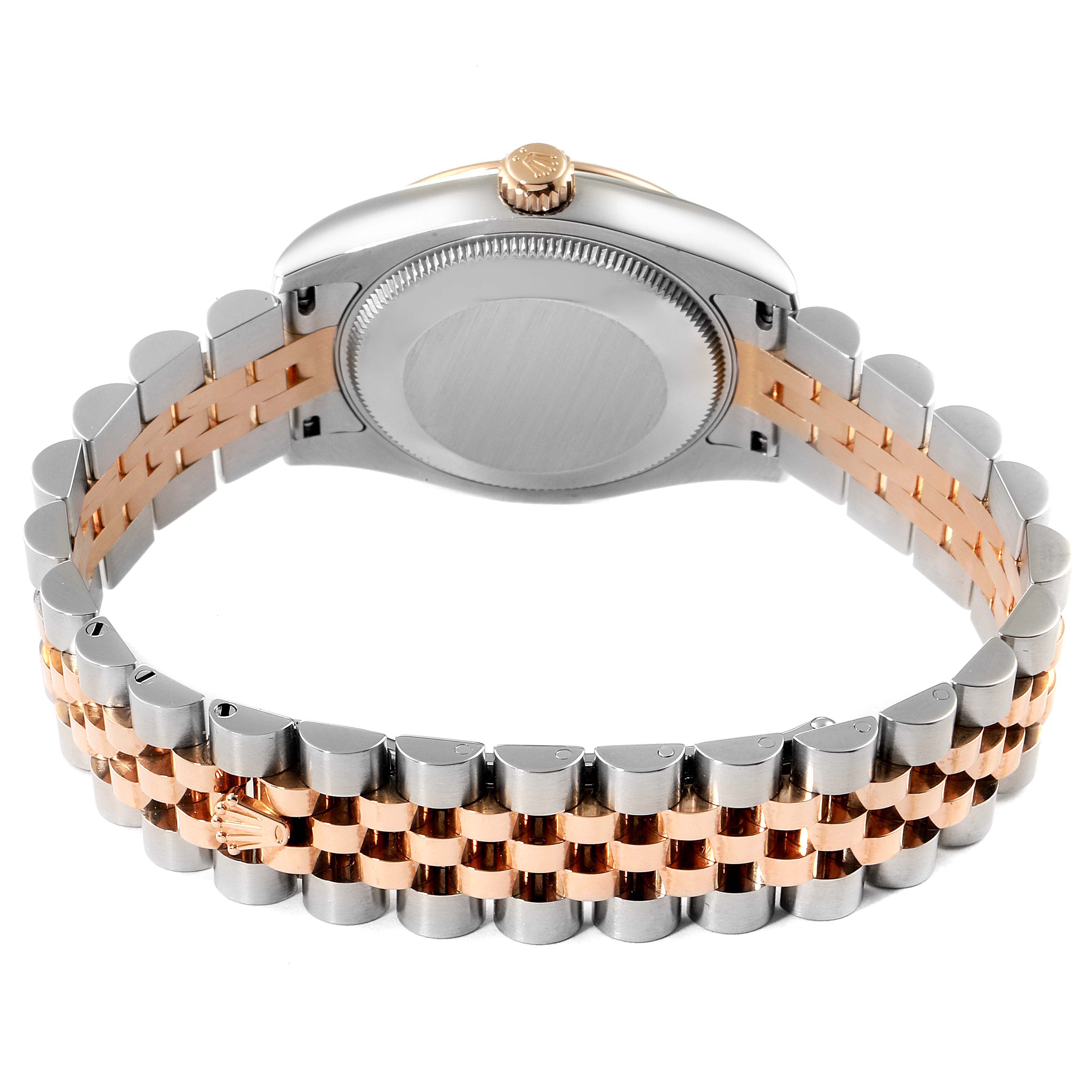 The image shows the back and bracelet of a Mid-Size Rolex watch, highlighting its two-tone metal design.