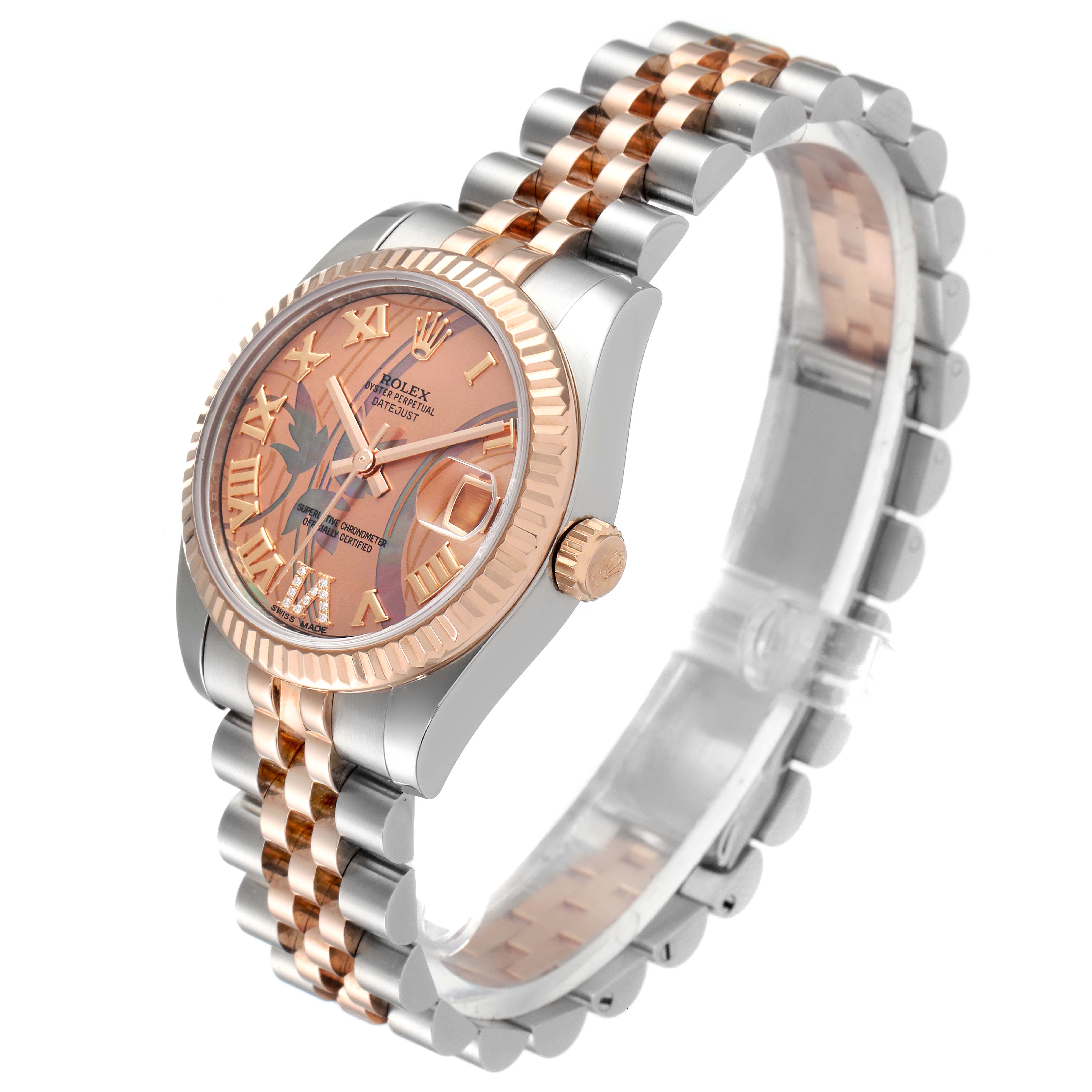 The image shows a side angle of a Rolex Mid-Size 178271 Women's Steel and Gold (two tone) Mother of Pearl Dial 178271 Women's Steel and Gold (two tone) Mother of Pearl Dial watch with a two-tone metal bracelet and a rose gold dial.