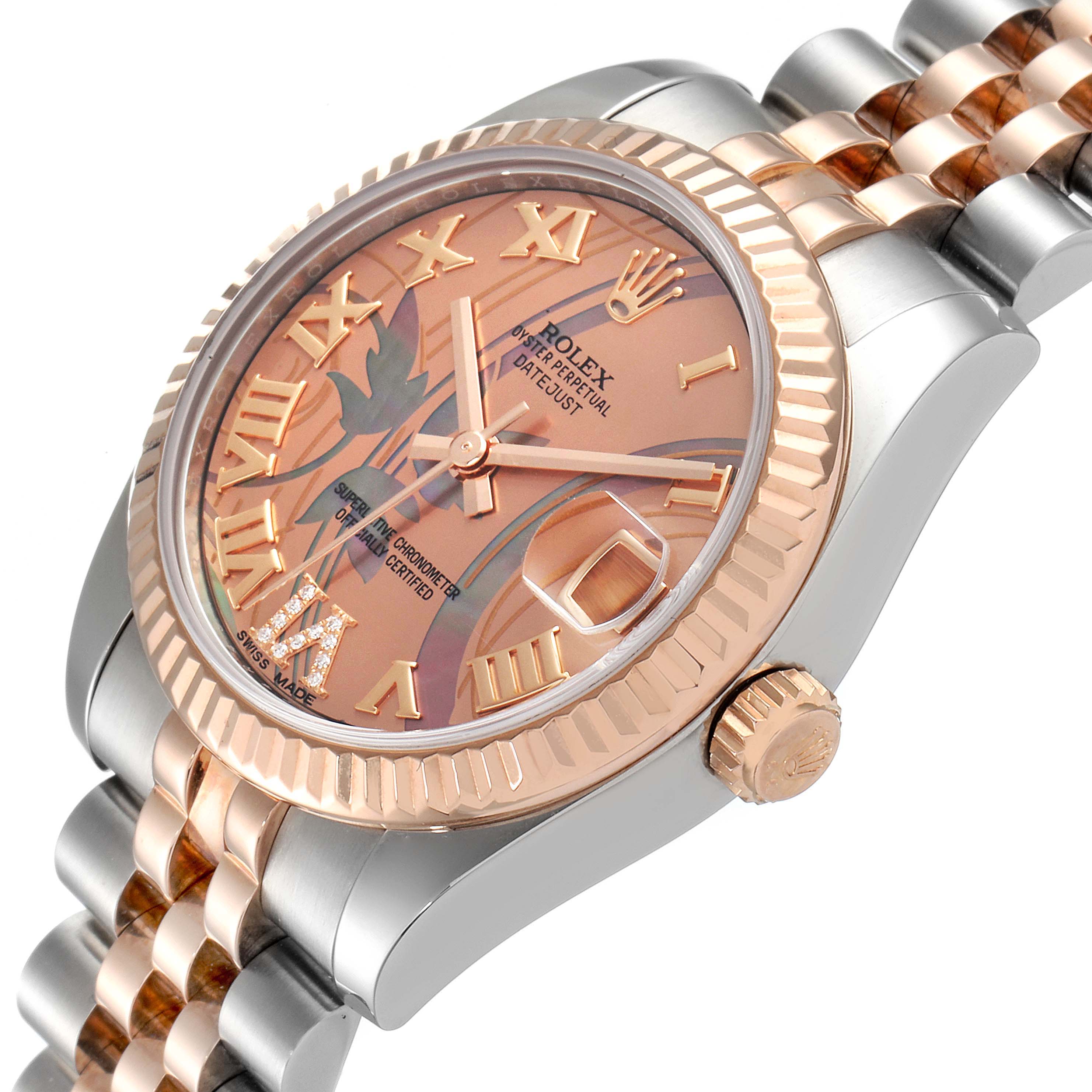 The Rolex Mid-Size 178271 Women's Steel and Gold (two tone) Mother of Pearl Dial 178271 Women's Steel and Gold (two tone) Mother of Pearl Dial watch is shown at an angle highlighting the face, crown, part of the bracelet, and the side of the case.