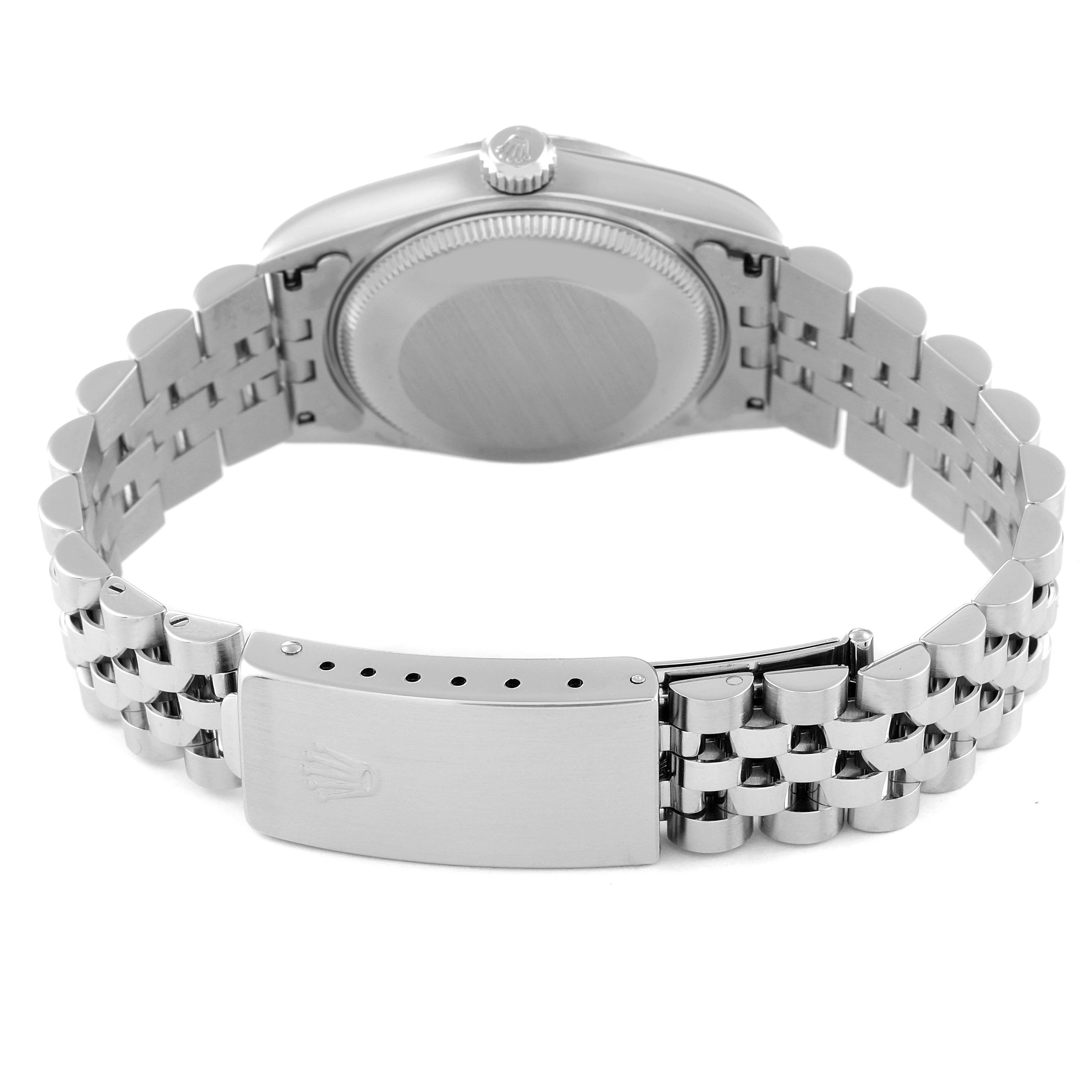 The image shows the back view of a Rolex Mid-Size 68274 Women
s Stainless Steel Pink Dial 68274 Women
s Stainless Steel Pink Dial model watch, displaying the case back, crown, and bracelet with clasp.