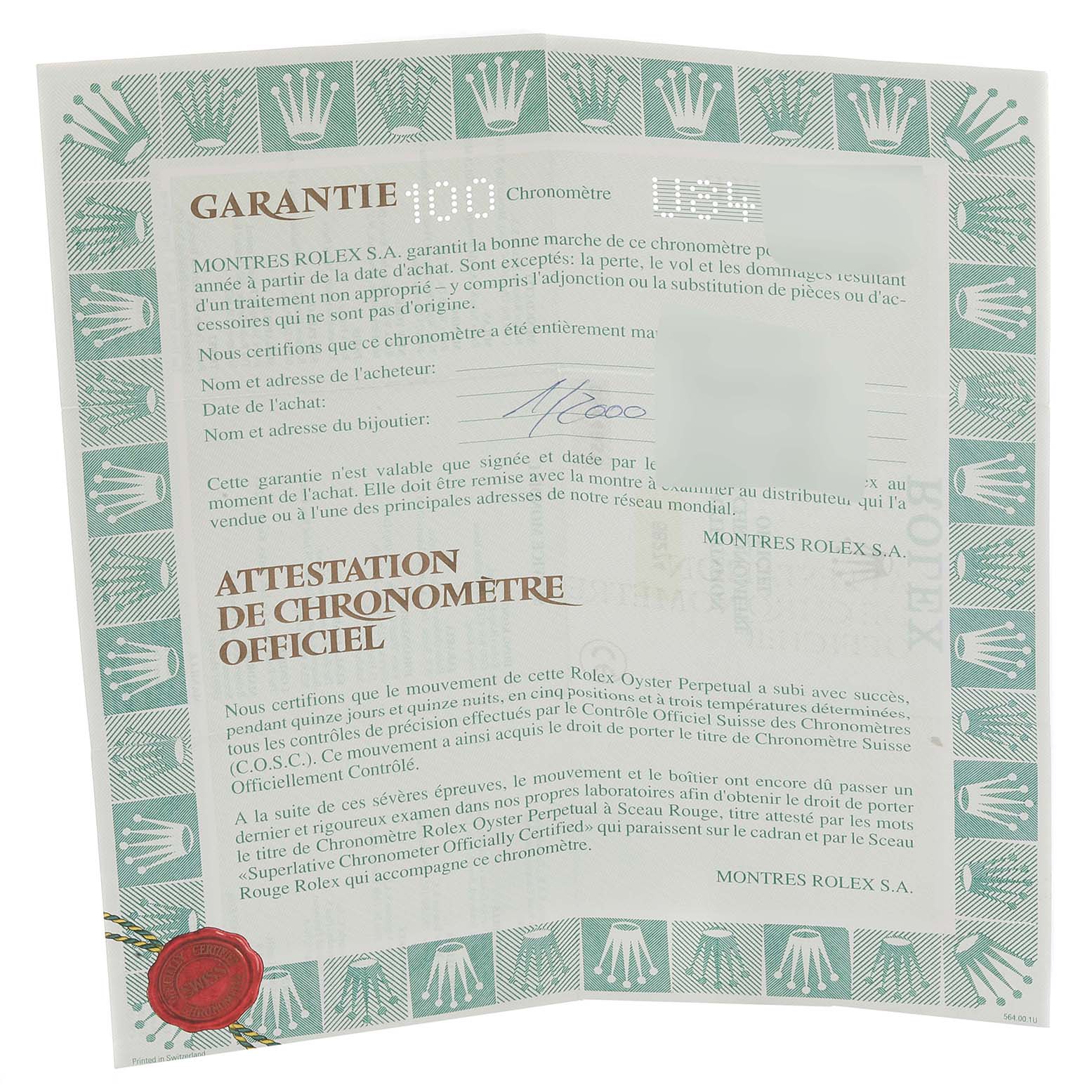 The image shows a Rolex warranty card and official chronometer certification for a Mid-Size Rolex watch.