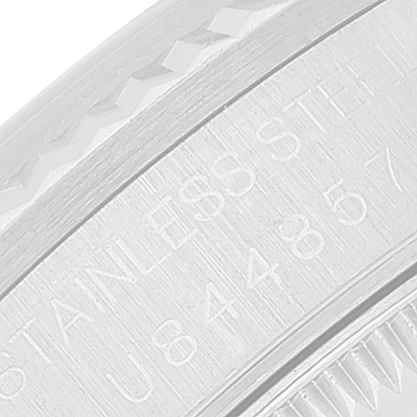 The image shows a close-up of the engraving on the stainless steel side of a Rolex Mid-Size 68274 Women
s Stainless Steel Pink Dial 68274 Women
s Stainless Steel Pink Dial model watch.